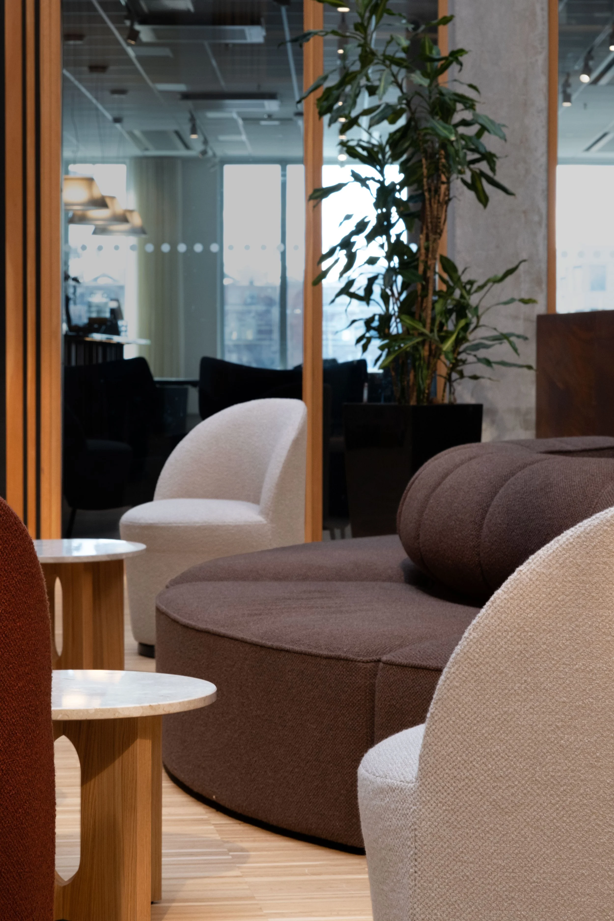 Lounge area with soft shapes and natural materials