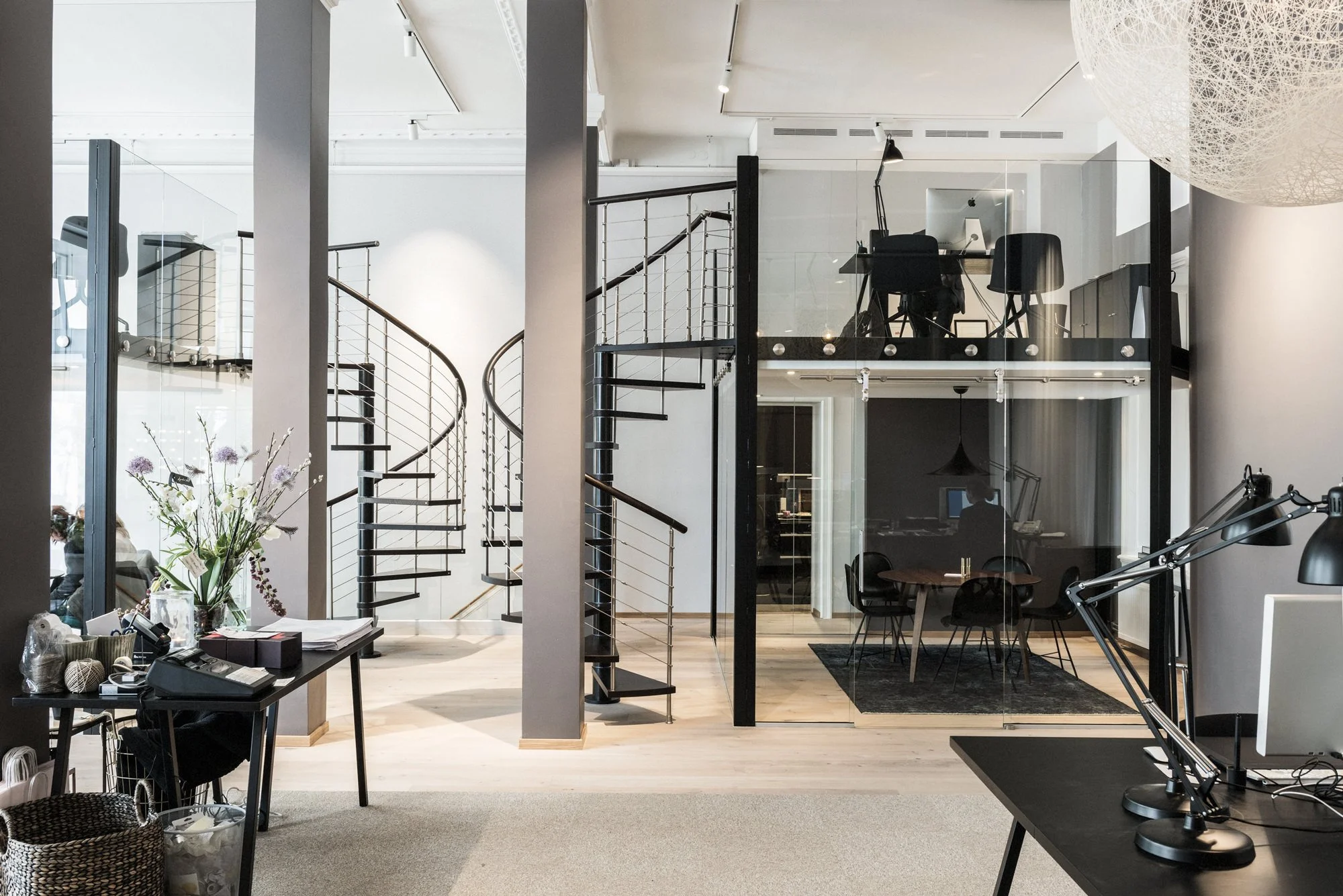 Black spiral staircase at Bolaget in Malmö.