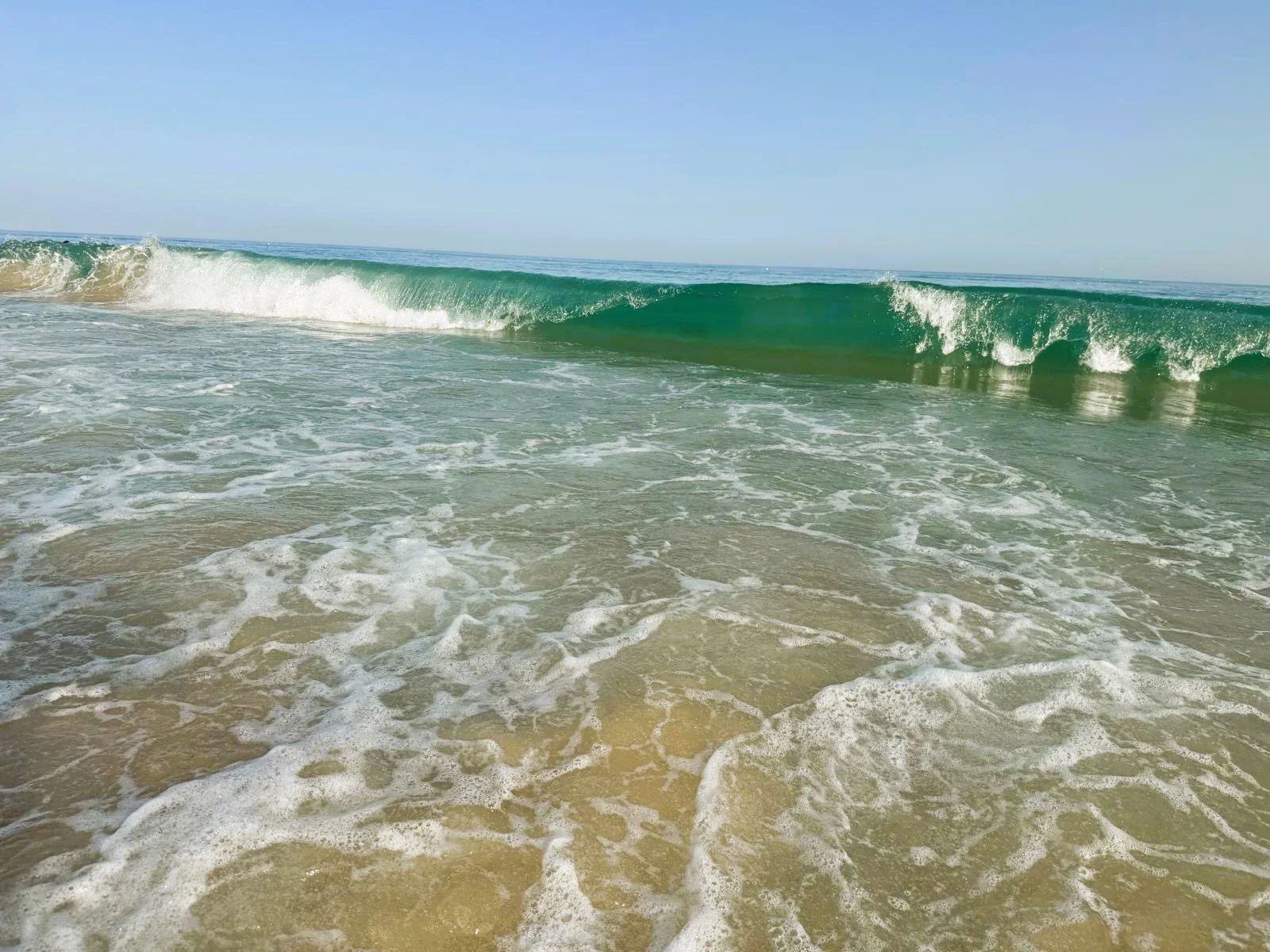 Wellen am Praia do Barril