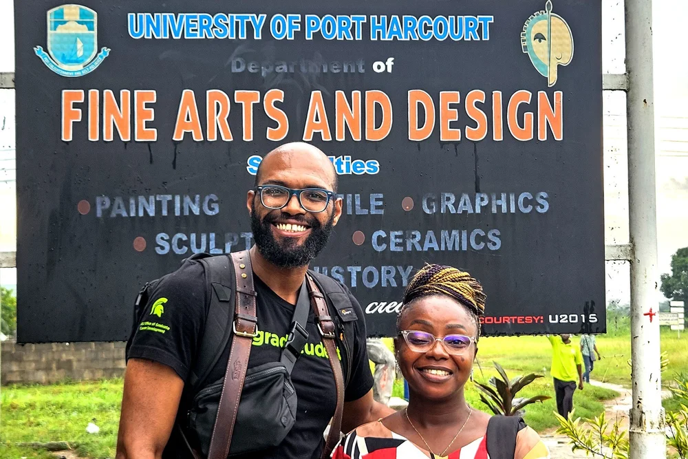  Vadu Rodrigues at the University of Port Harcourt in Nigeria with Primrose Ochuba, artist, art curator, and lecturer in the Department of Fine Arts and Deign at the University of Port Harcourt. 
