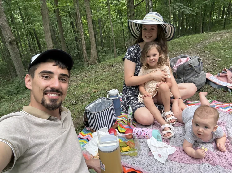 The Walls family together at a picnic