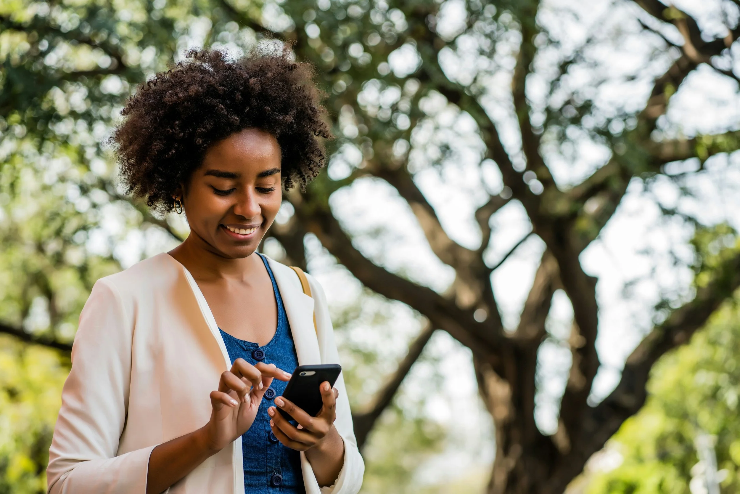 Girl typing on her phone