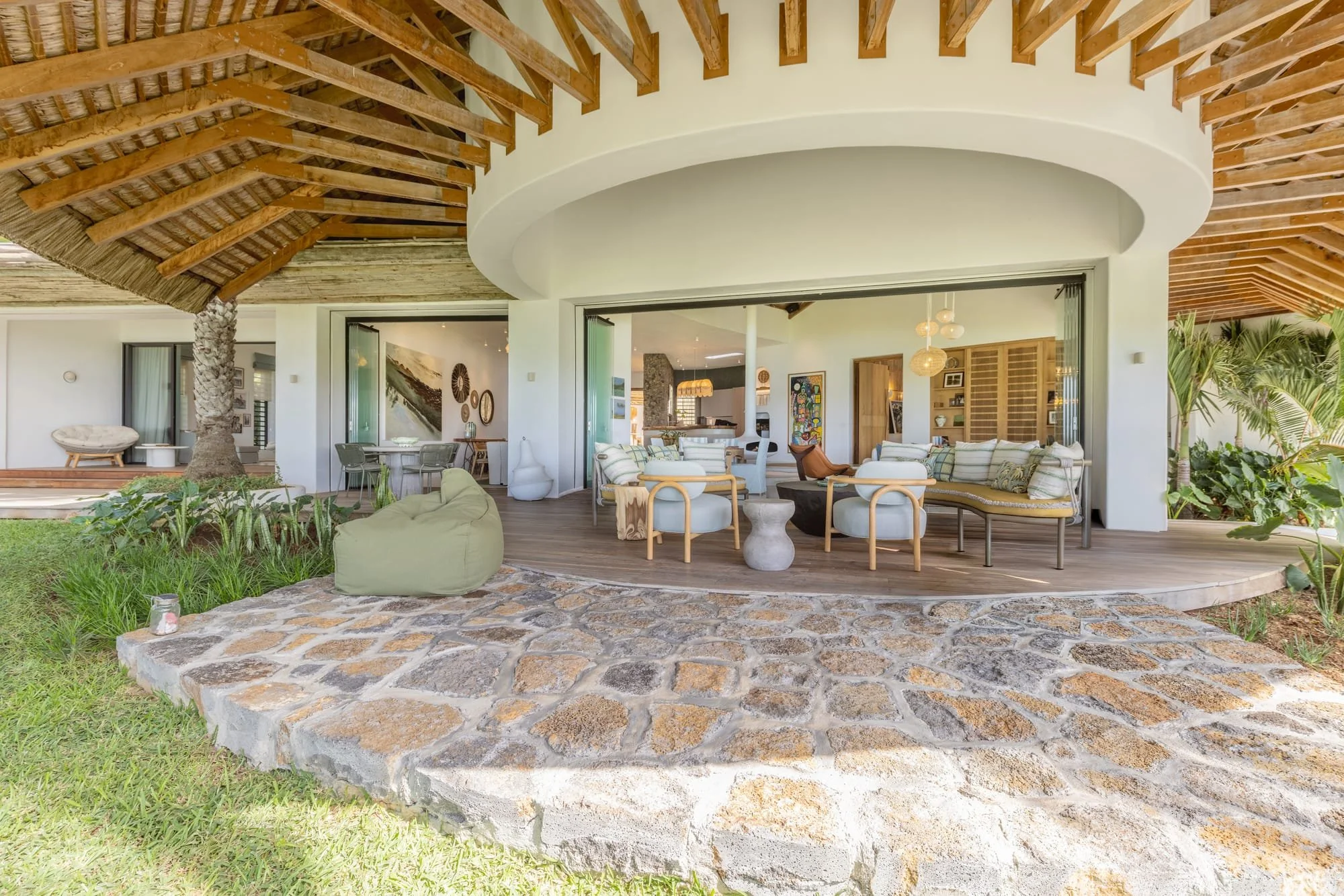 Wide garden view of the villa terrace and open living spaces