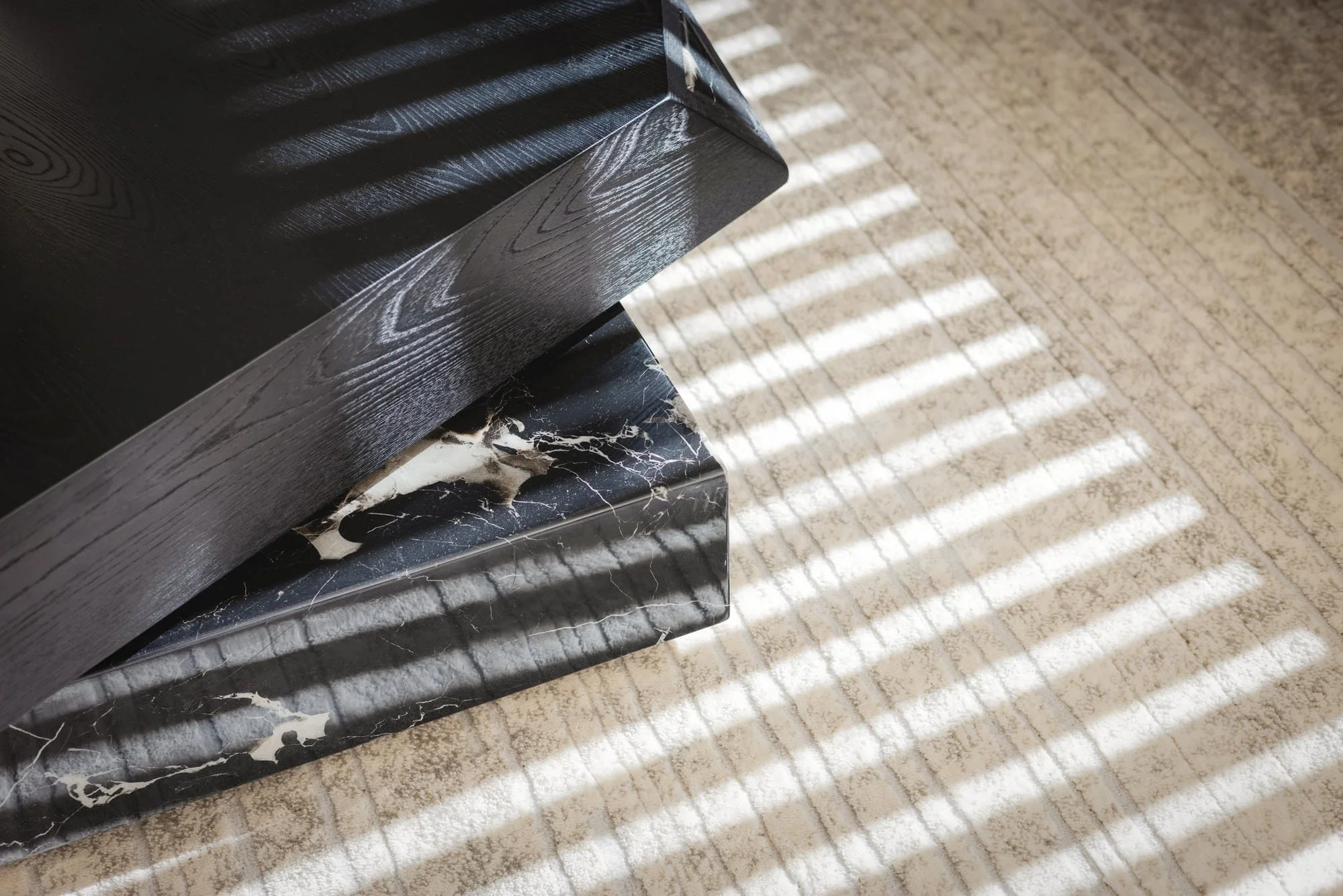 Marble coffee table detail in sunlight at Krono Residence