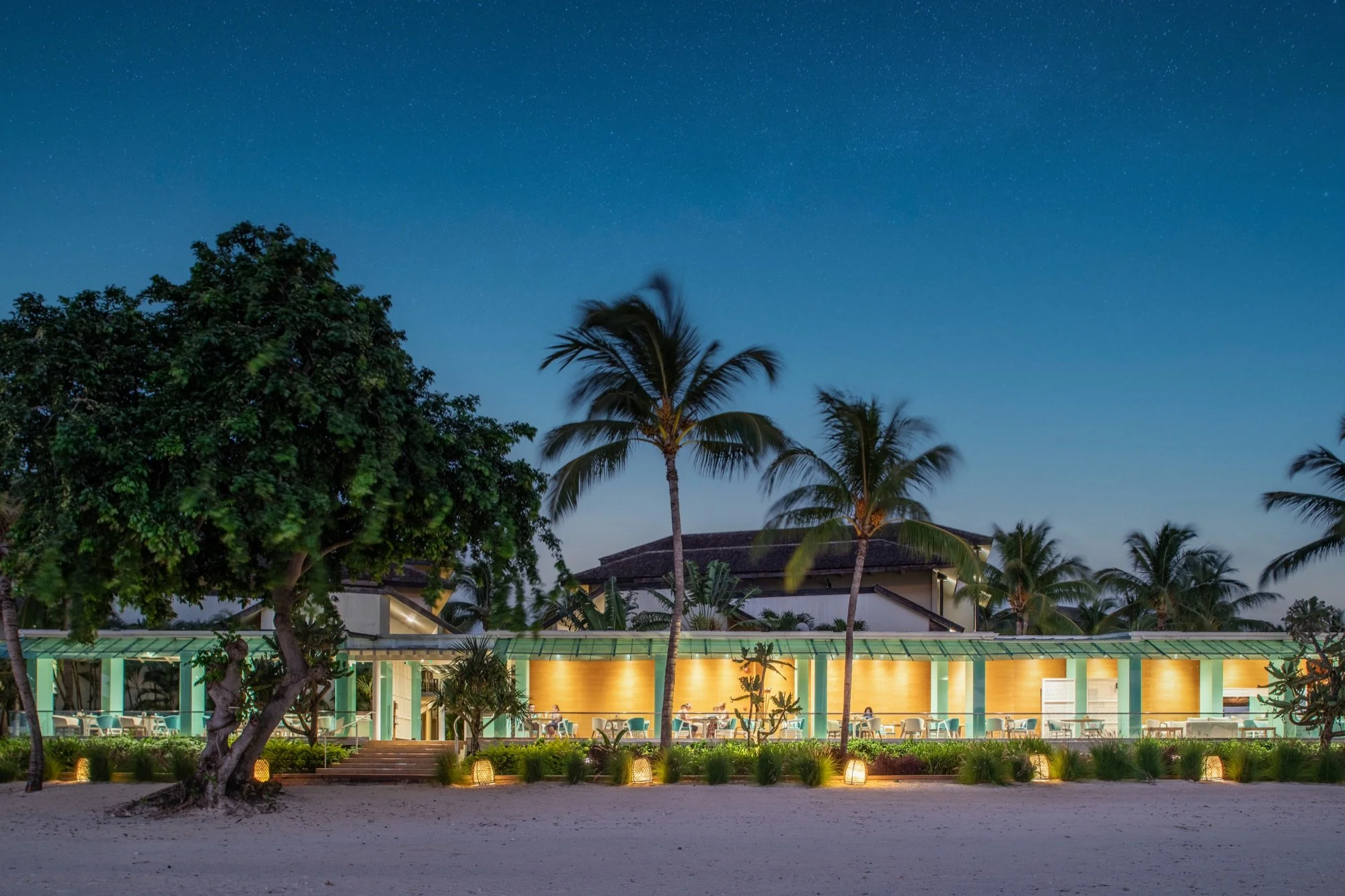 Luxury hotel space with open architecture and tropical surroundings