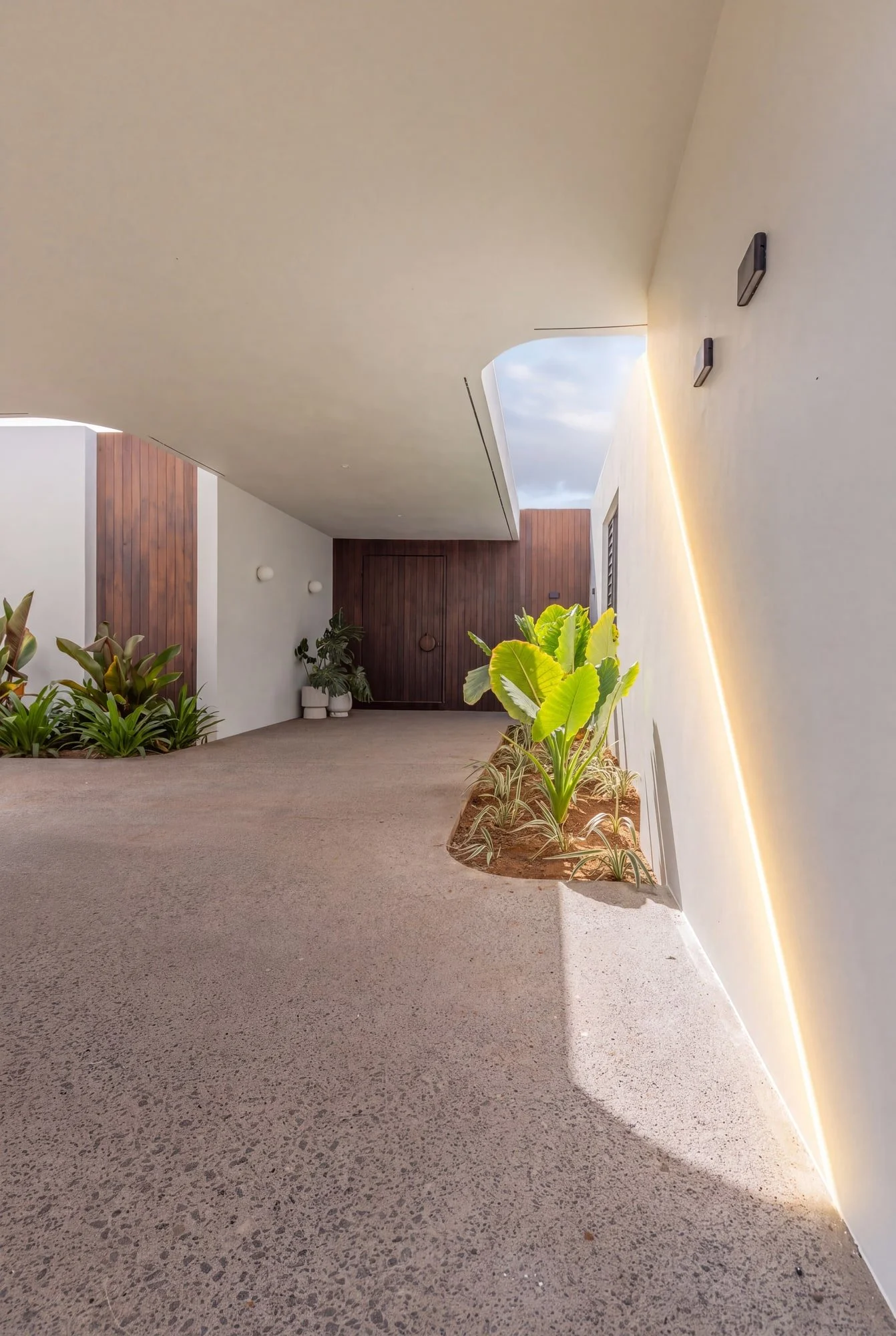 Covered entrance courtyard with skylight at Krono Residence