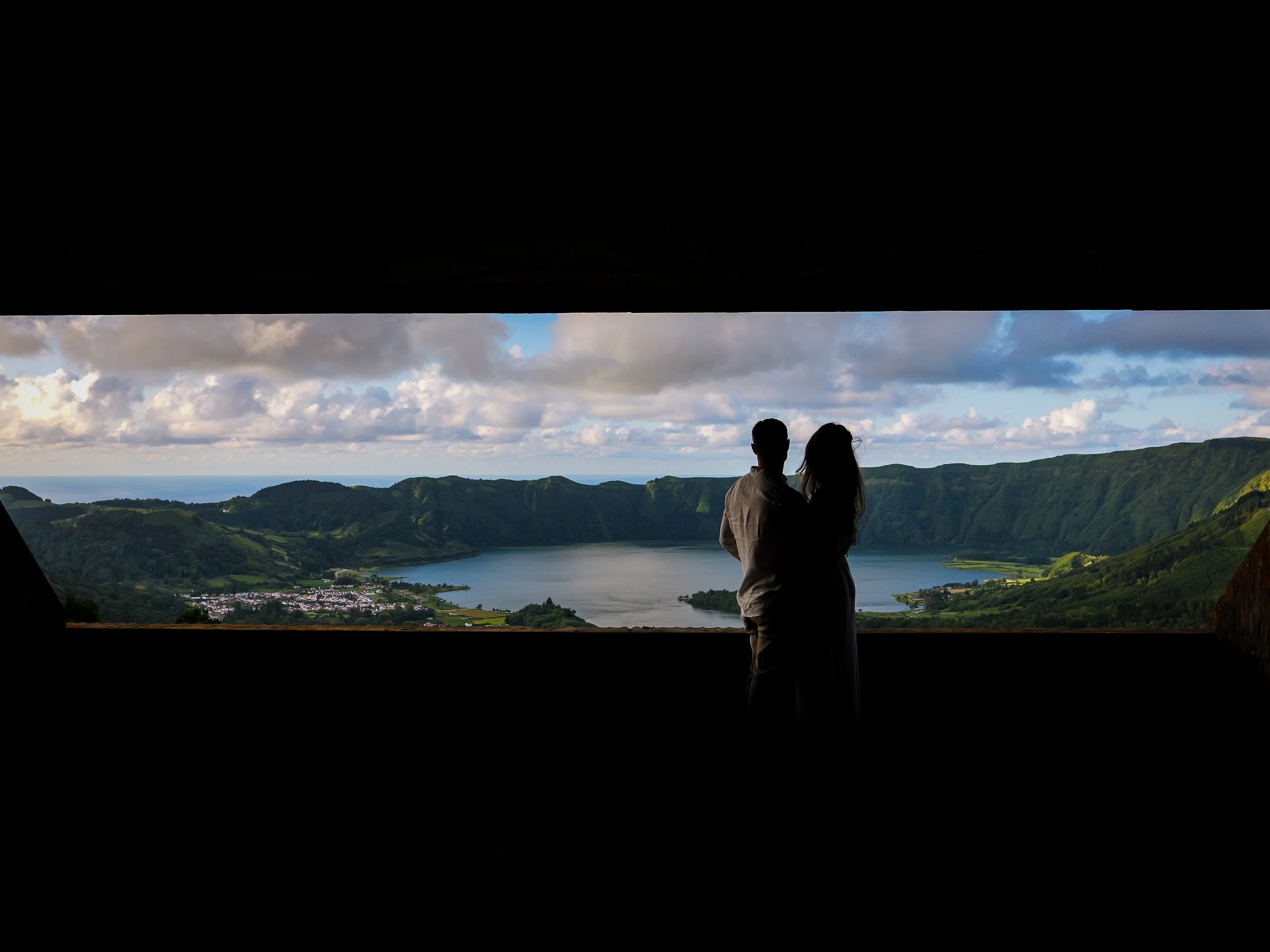Couple enjoying a private photo tour at Sete Cidades crater lake in São Miguel, Azores, captured during a scenic private tour experience with a local guide and photographer