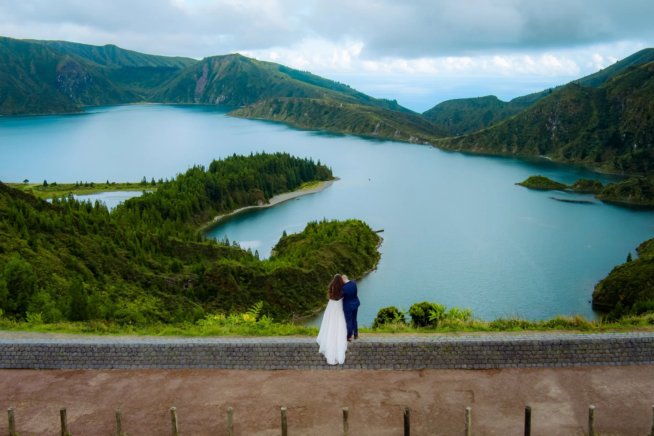 Wedding couple overlooking Sete Cidades lagoon in São Miguel, Azores during an elopement photoshoot