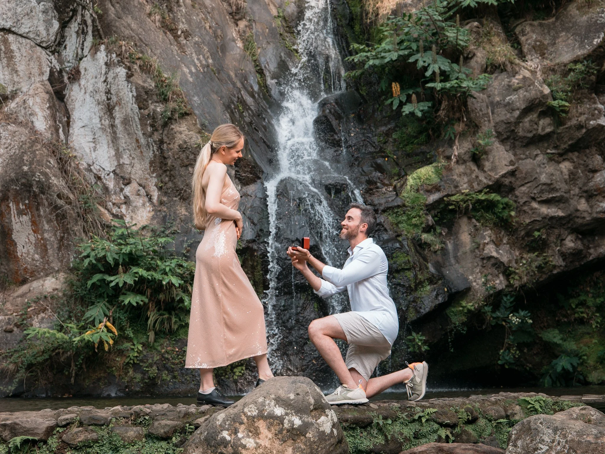 Surprise marriage proposal photoshoot at a waterfall in São Miguel during a private Azores photo tour