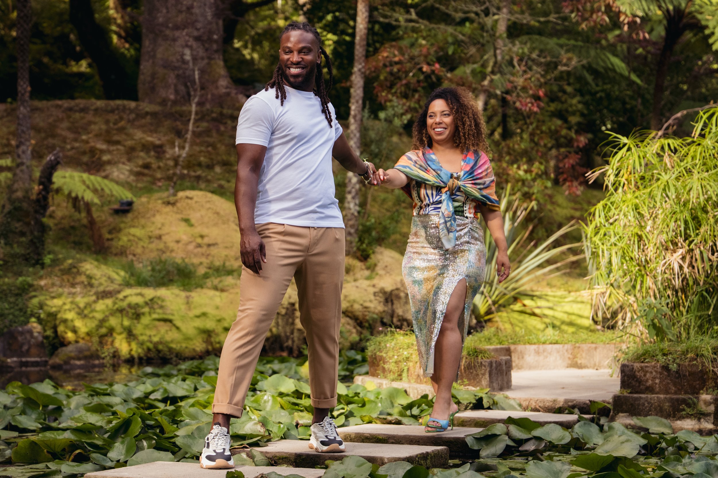 Couple walking through Terra Nostra garden in Furnas, São Miguel, Azores, during a private photo session with an Azores photographer.