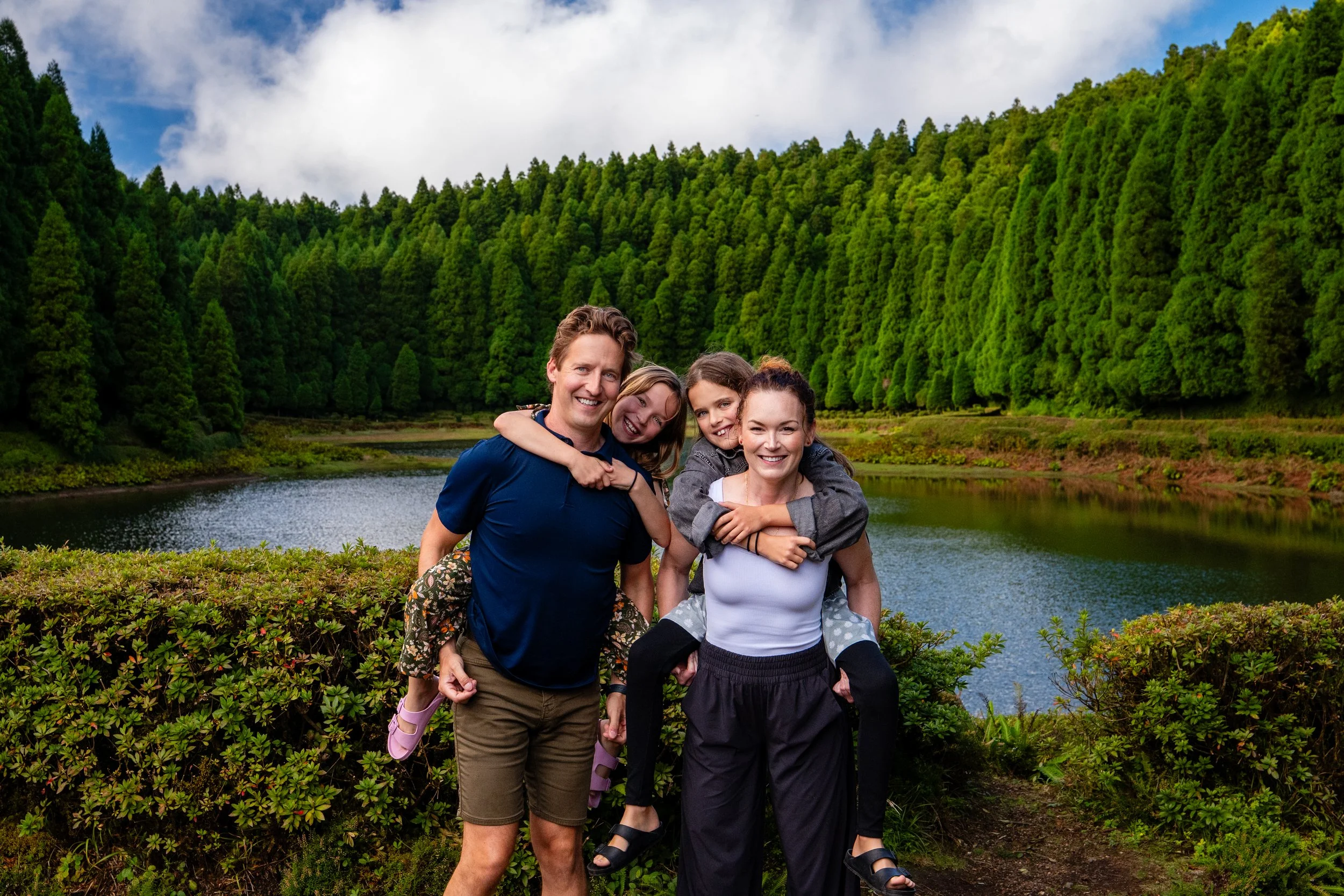 Family enjoying a private photo tour by a lake in São Miguel Azores