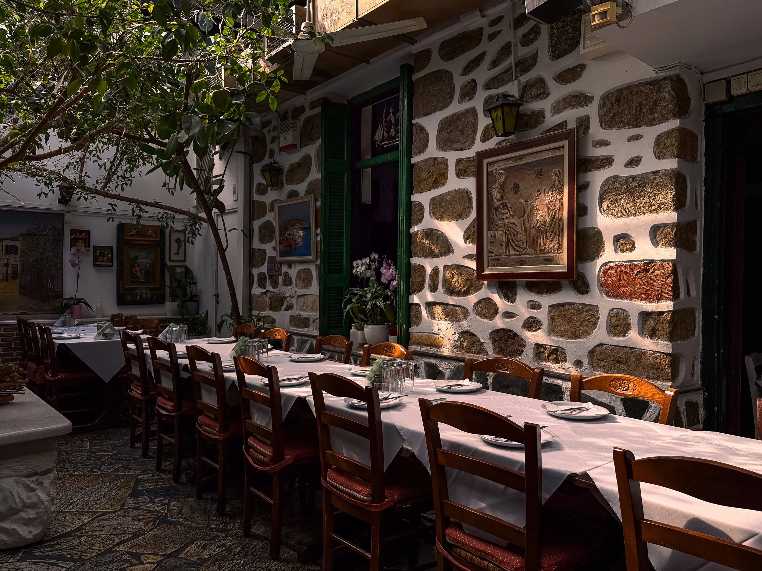 Light flutters in through the skylights in a restaurant, Athens, Greece. 