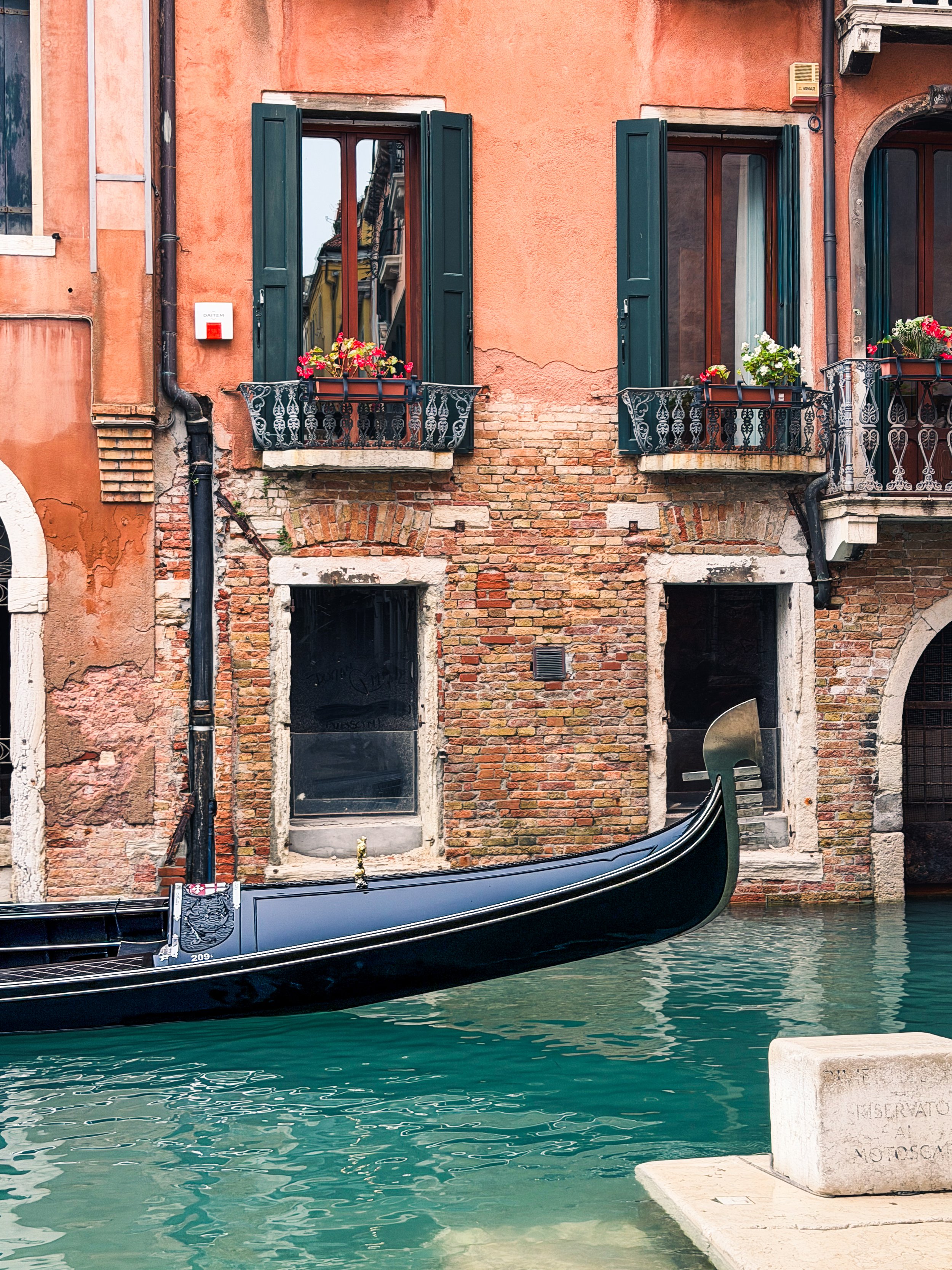 Flowers, Canals, and Gondolas. Venice, Italy