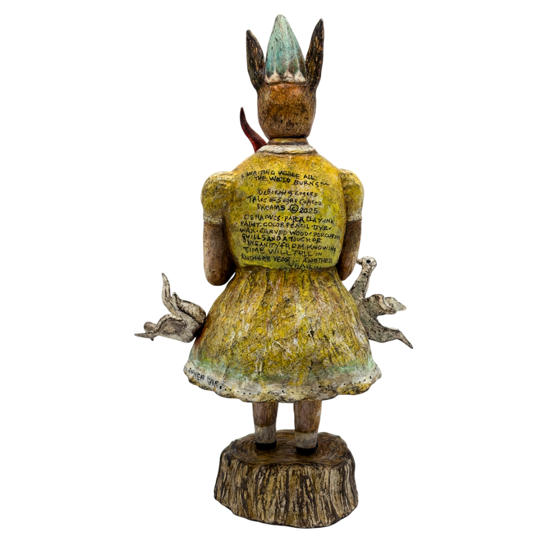 Another Year...Another Year - All the World is Watching (back) 2025, ceramic with mixed media, 9 x 6 x 5 inches 