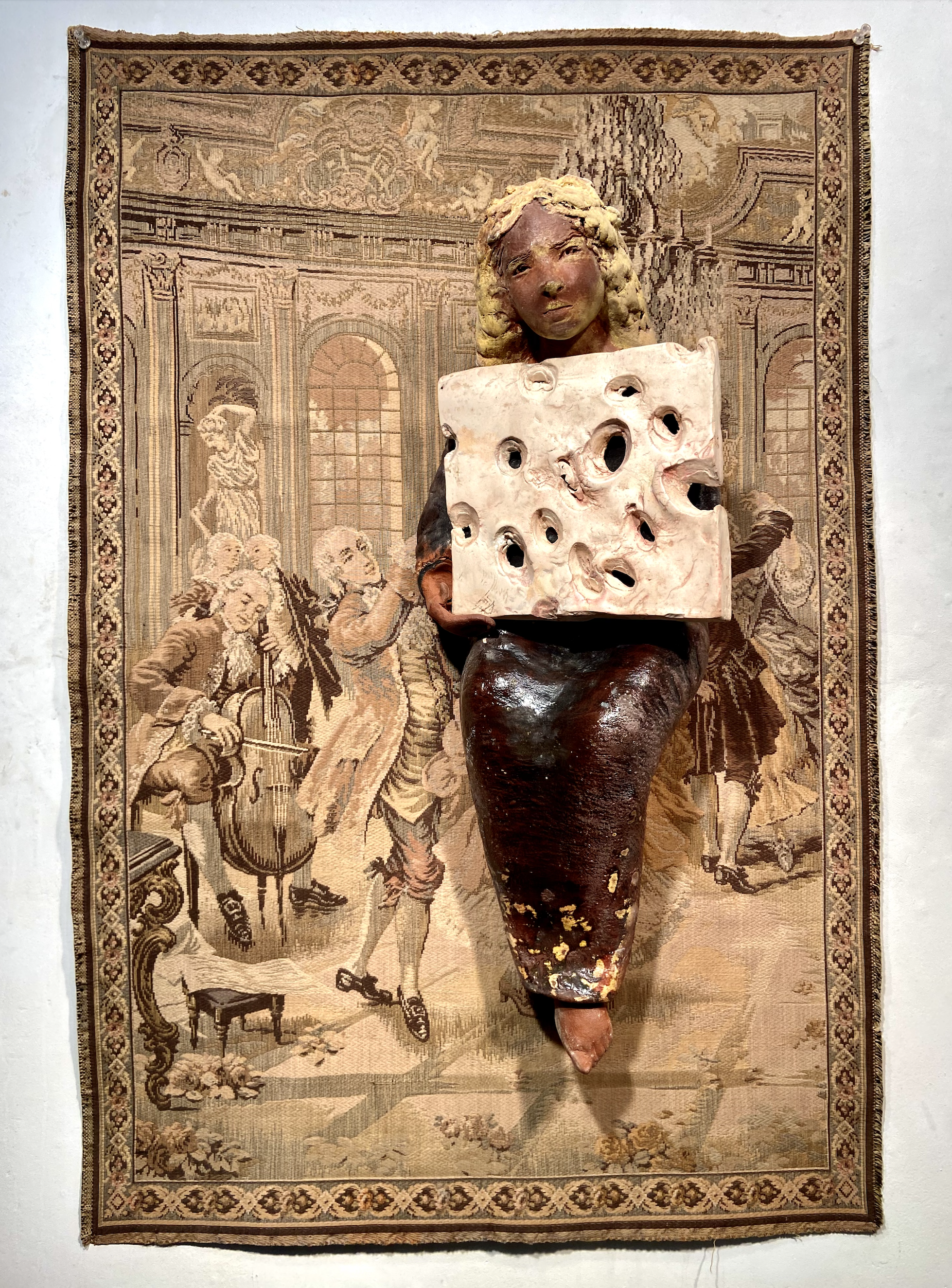 Arthur Gonzalez,
A History Full of Holes, 2024,
Ceramic, glaze, found tapestry, 38 x 25 x 6 in