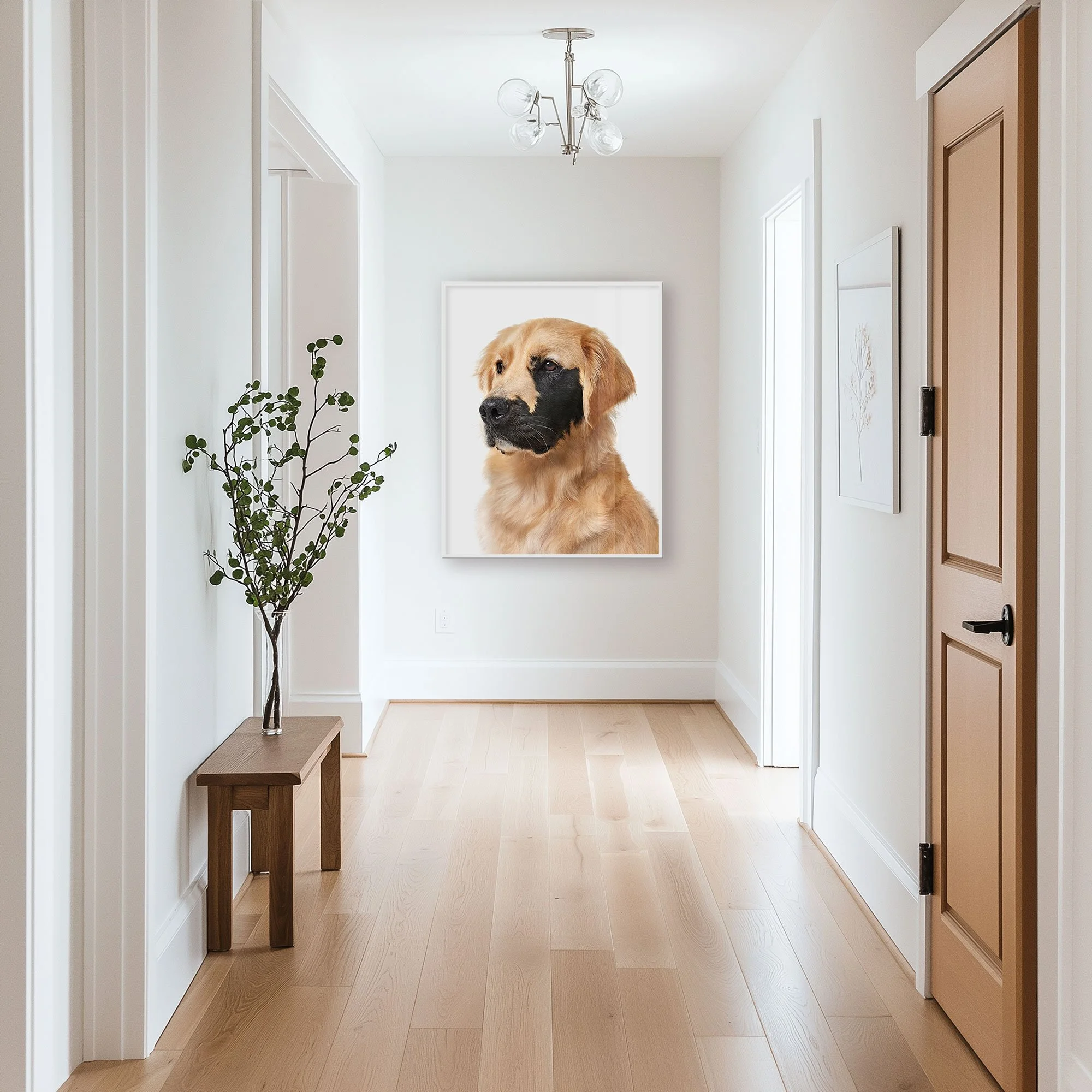 Enzo the Golden Retriever portrait by Randal Ford displayed at the end of a bright hallway