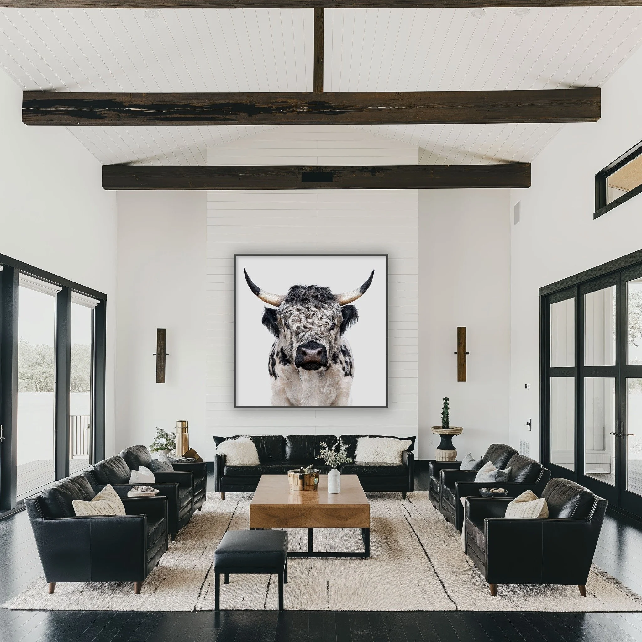High Park Bull portrait by Randal Ford displayed above a fireplace in a spacious living room