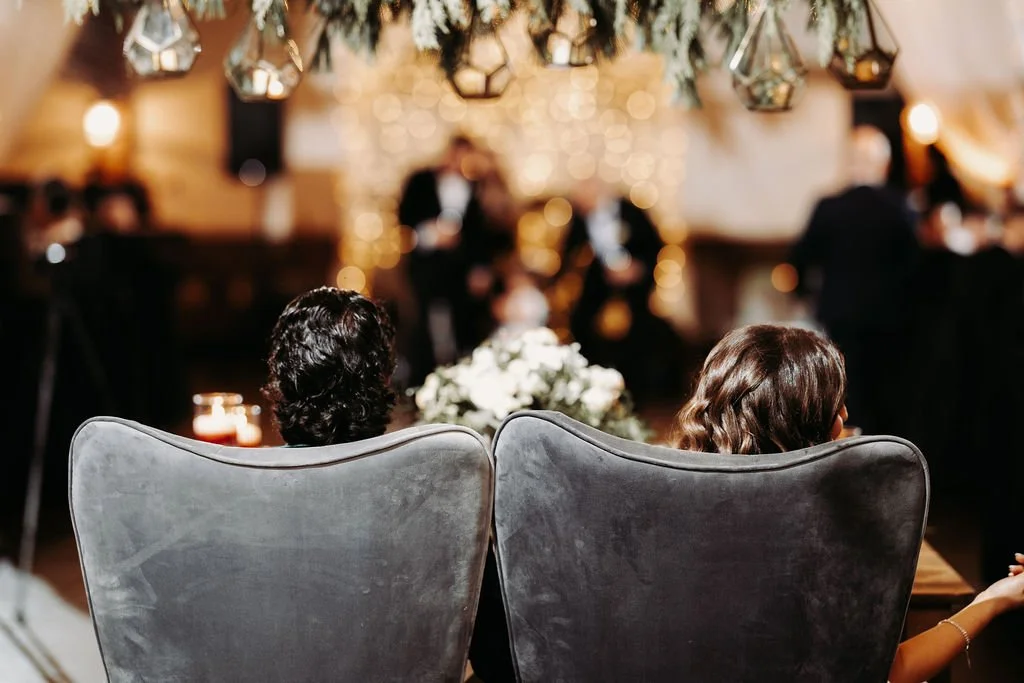 Charcoal gray tufted chair QTY 2 Photo by Graham Marley Photography