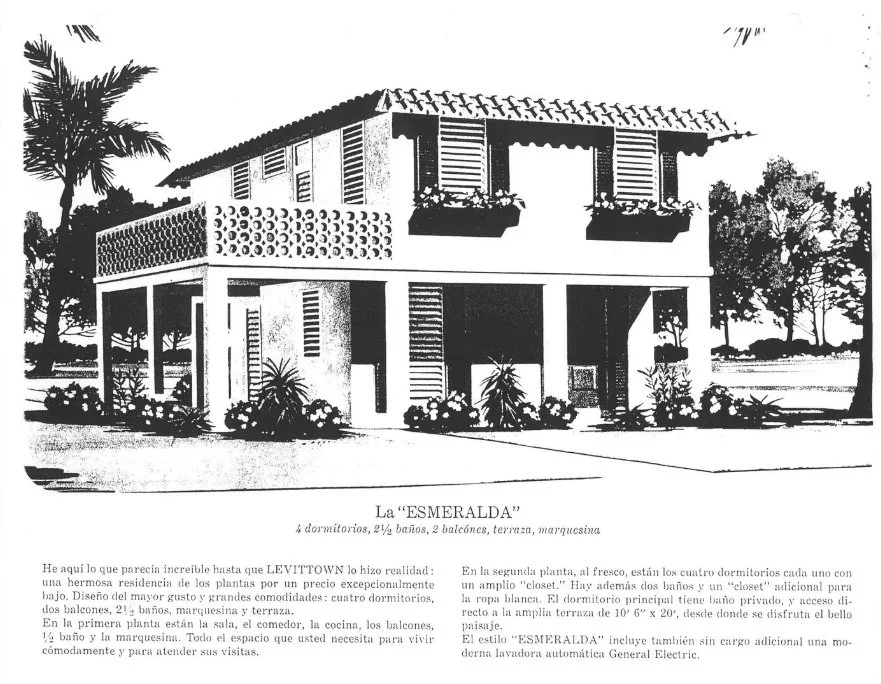 Black and white drawing of a two-story house with a balcony, shutters, and decorative window boxes, surrounded by trees and plants. Levittown
