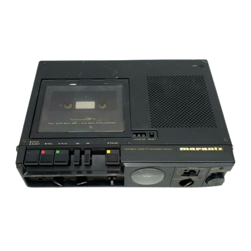 A vintage portable cassette recorder with various buttons, switches, and a built-in speaker.