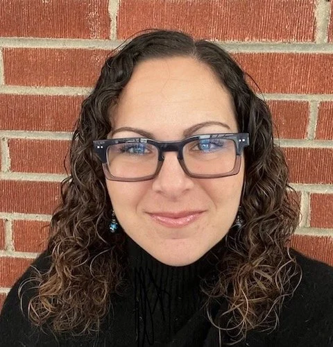 an image of Jaimee Arnoff smiling at the camera