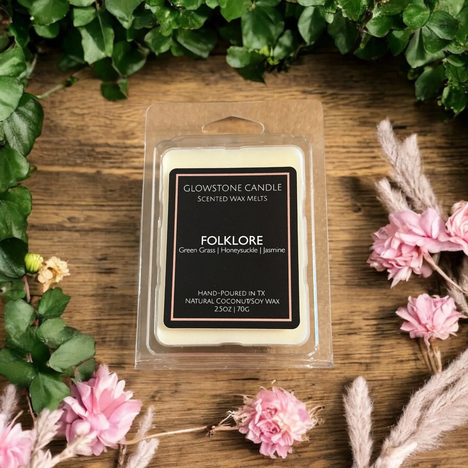 folklore wax melt photo showing scent notes of green grass, honeysucle, and jasmine. Natural soy/coconut wax