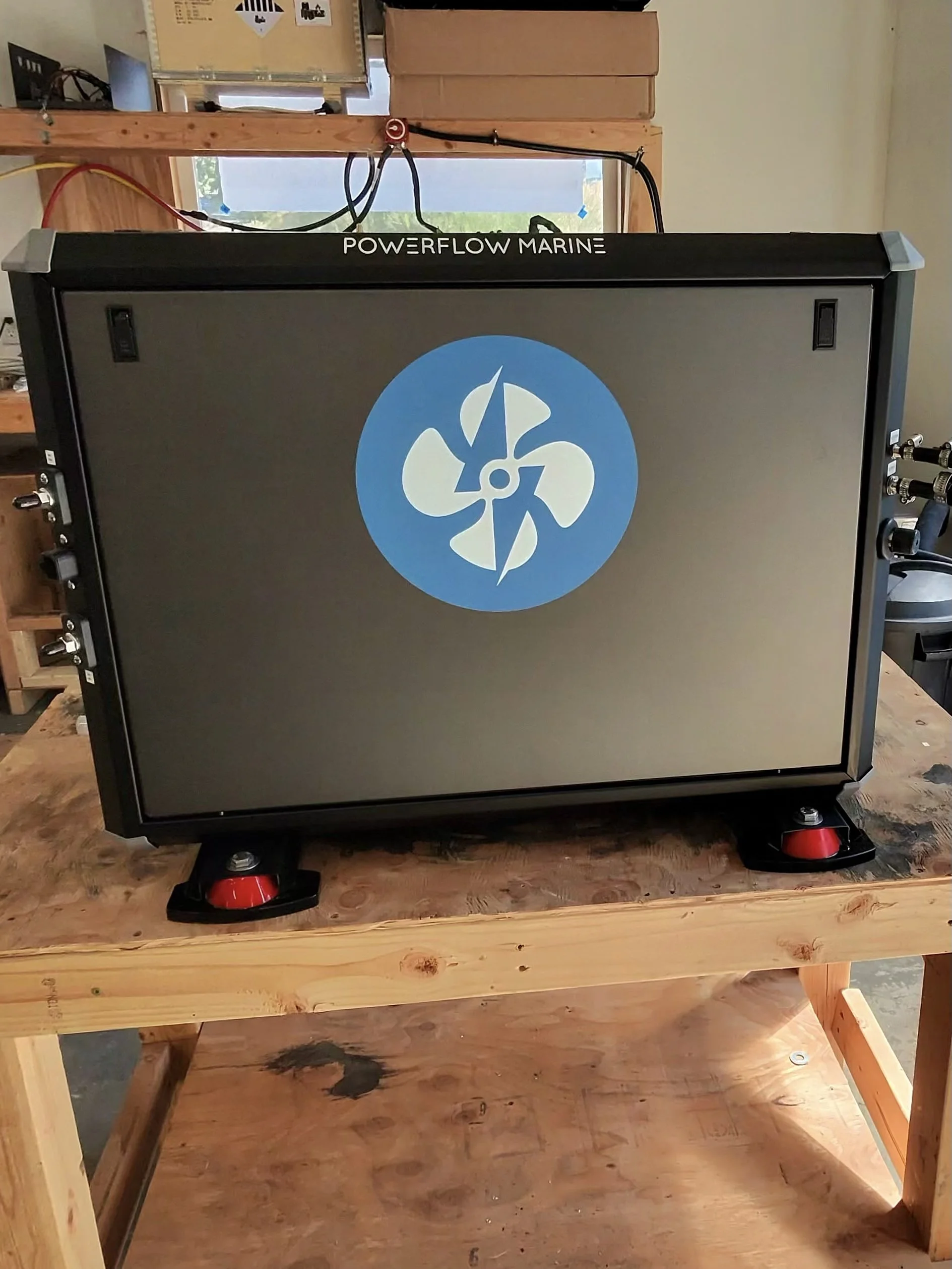 Powerflow Marine 48V DC marine generator, sound-shielded enclosure with anti-vibration mounts, on the shop bench