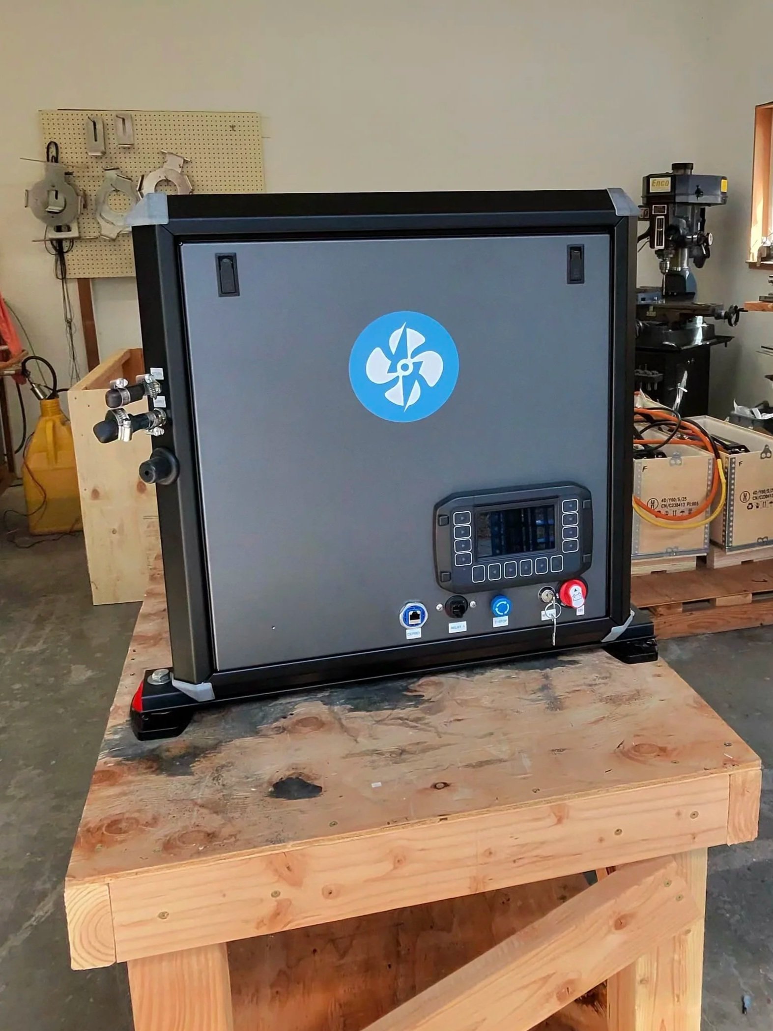 Front control panel of the Powerflow Marine 48V DC generator with integrated display, start controls and E-stop
