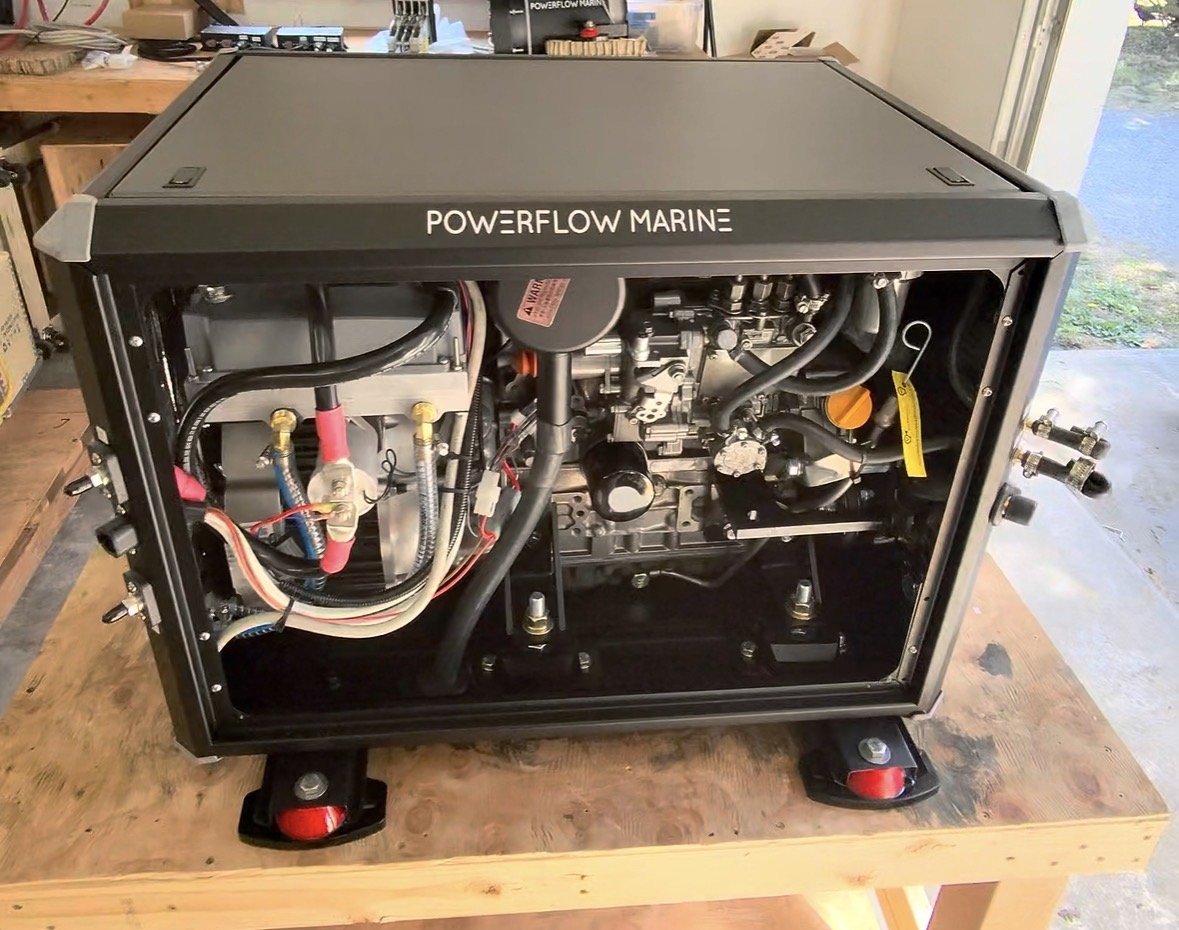 Inside the Powerflow Marine 48V DC diesel generator with service panel open, showing the Yanmar engine and wiring