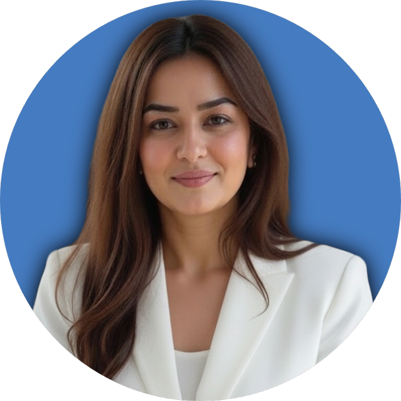Lama Malaeb, AI coach and trainer in Dubai, UAE, founder of AI Growth Hub, wearing a white blazer against a blue background.