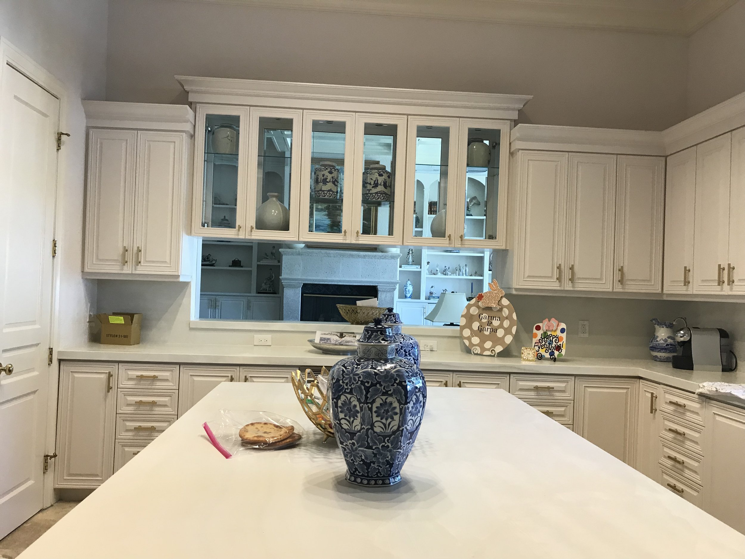 Cabinet Painting After Photo. Painting Cabinets After Photo. Cabinet Transformation. Cheapest way to remodel kitchen. Fastest Way to Remodel Kitchen.
