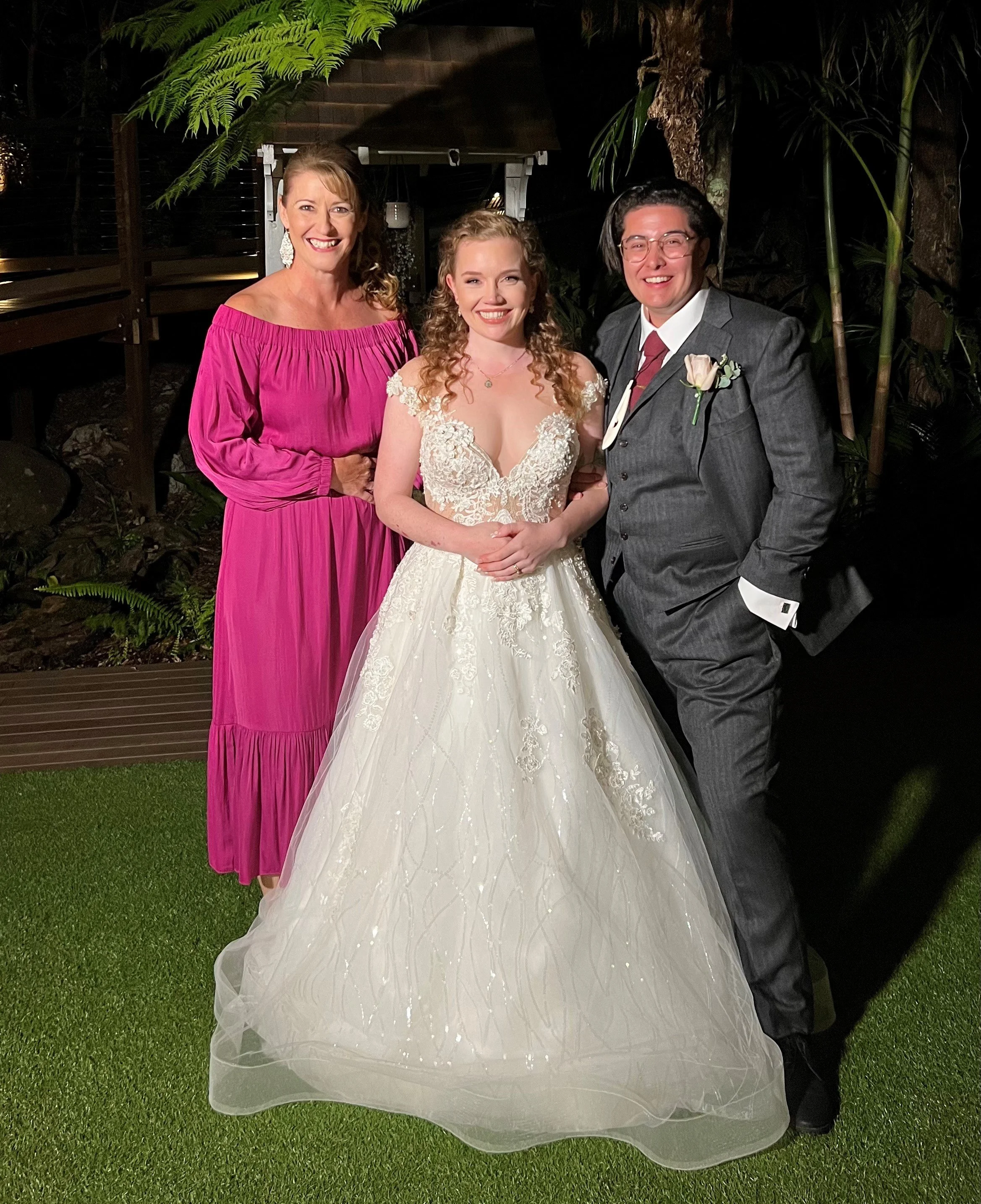 Happy couple with their Brisbane wedding celebrant and MC