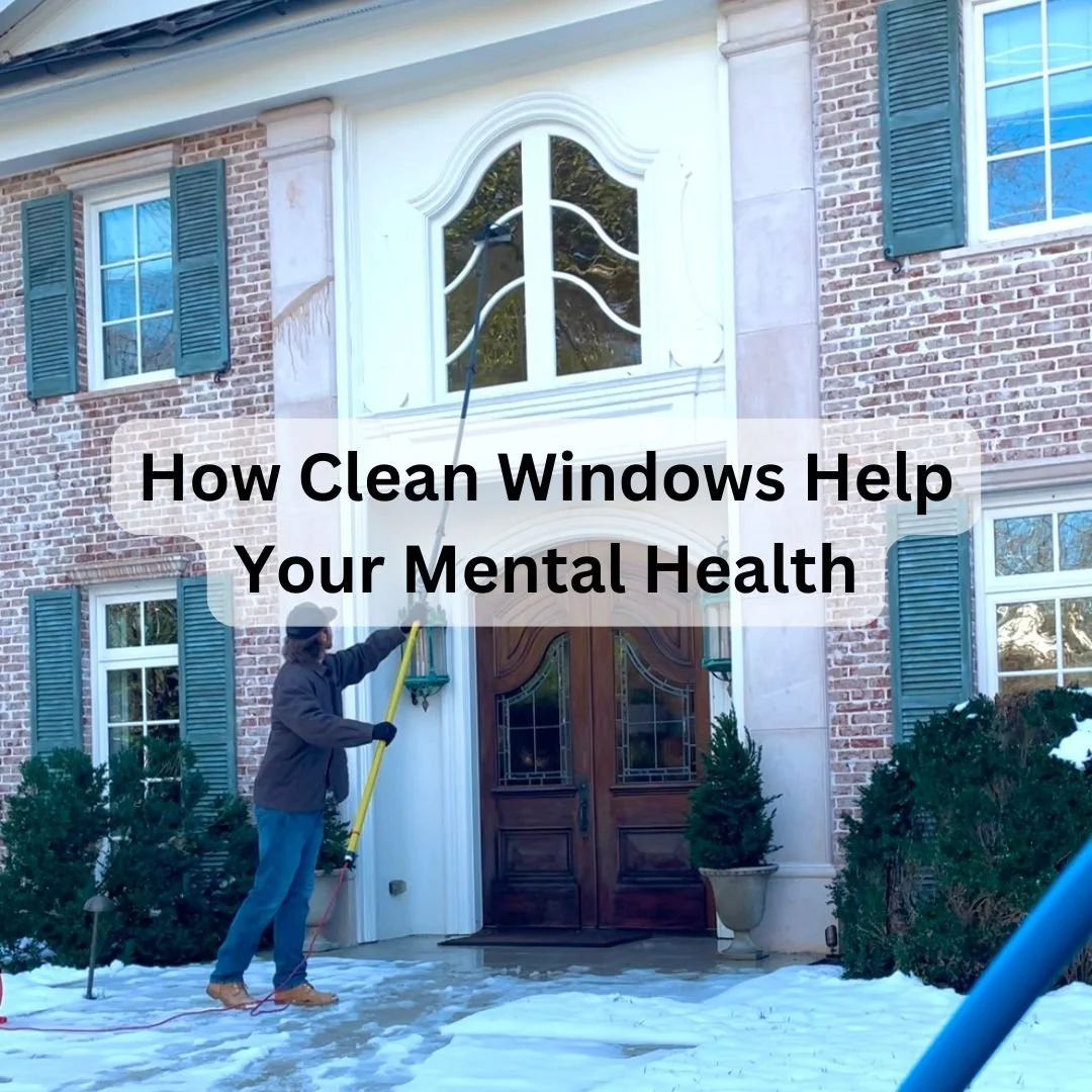 Cleaning a large unique window on a home