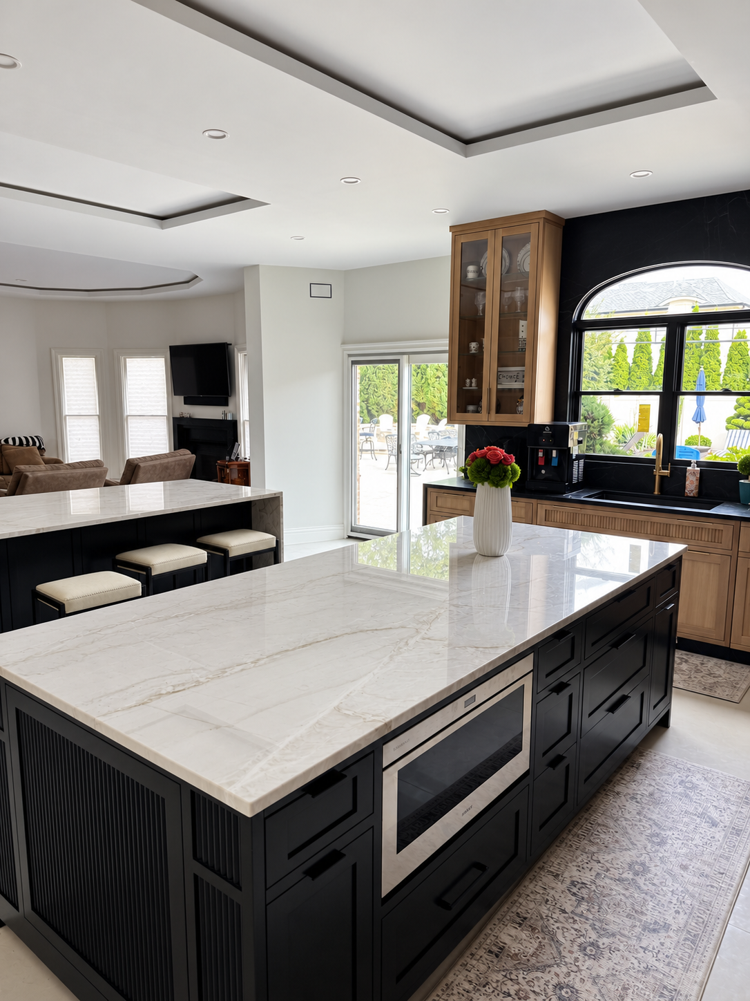 Roslyn kitchen renovation with a dark island and natural wood cabinetry — BAWI project