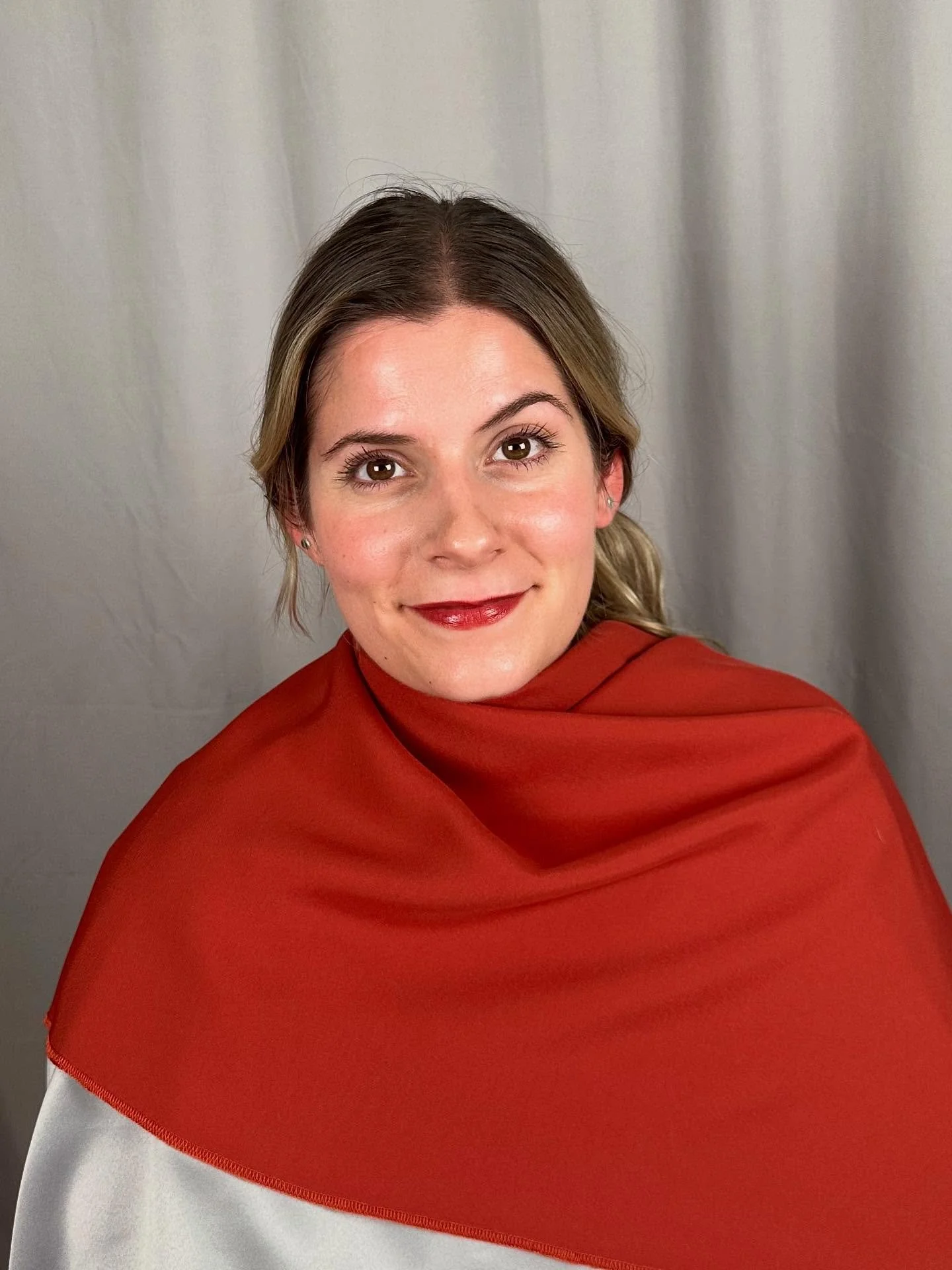 This stunning beauty just GLOWS in the richness of the dark autumn colors. I mean how captivating is she in this warm rust drape?!? Can you imagine her in a turtleneck in this color?!

This client had been dying her hair a bright blonde for years l, 