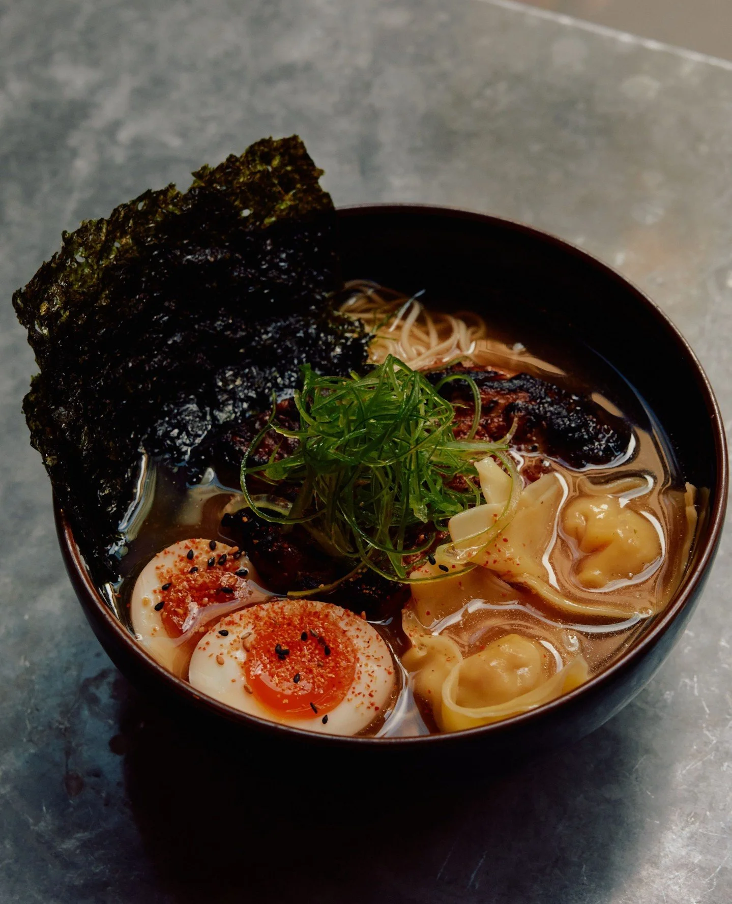 Our ramen &mdash; warming broth is poured over tender noodles and topped with grilled chicken, prawn &amp; chicken dumplings, and a soy-marinated egg. ⁠
⁠
Available weekdays from midday until sold out. ⁠
⁠
