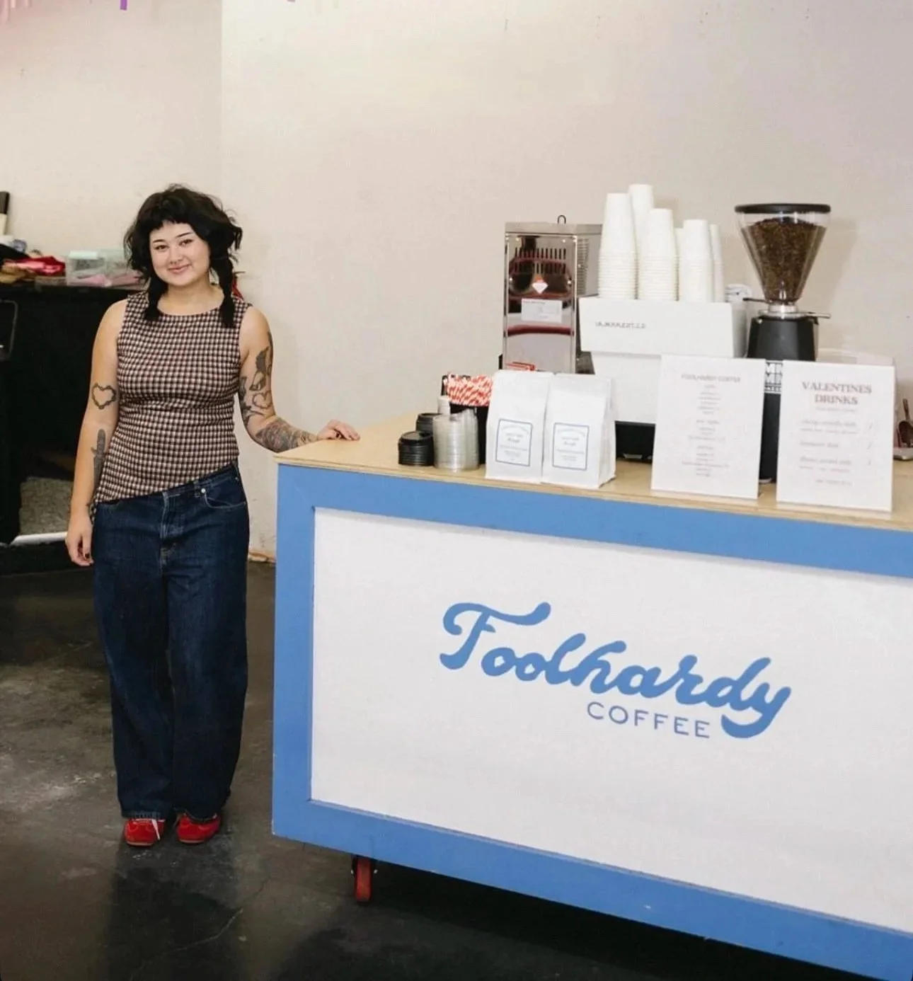 kate standing next to cart