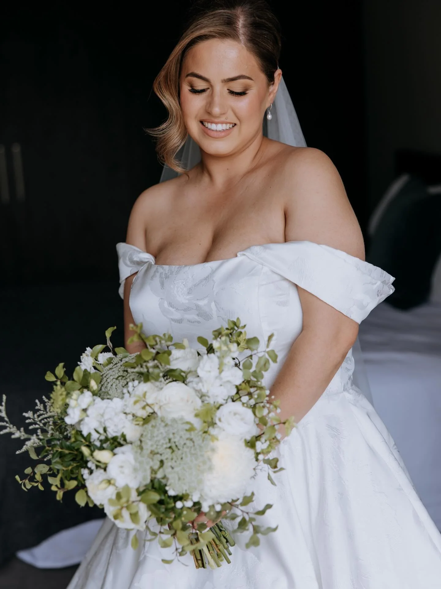 Alicia, you're a vision with that gorgeous dress, hair, makeup and classic green and white bouquet. #nagambieflorist #nagambiewedding #mitcheltonweddings