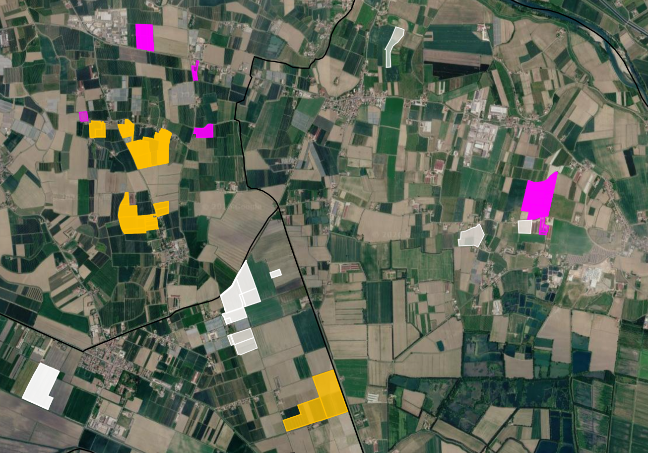 Satellite map of agricultural fields with highlighted areas in purple, yellow, and white.