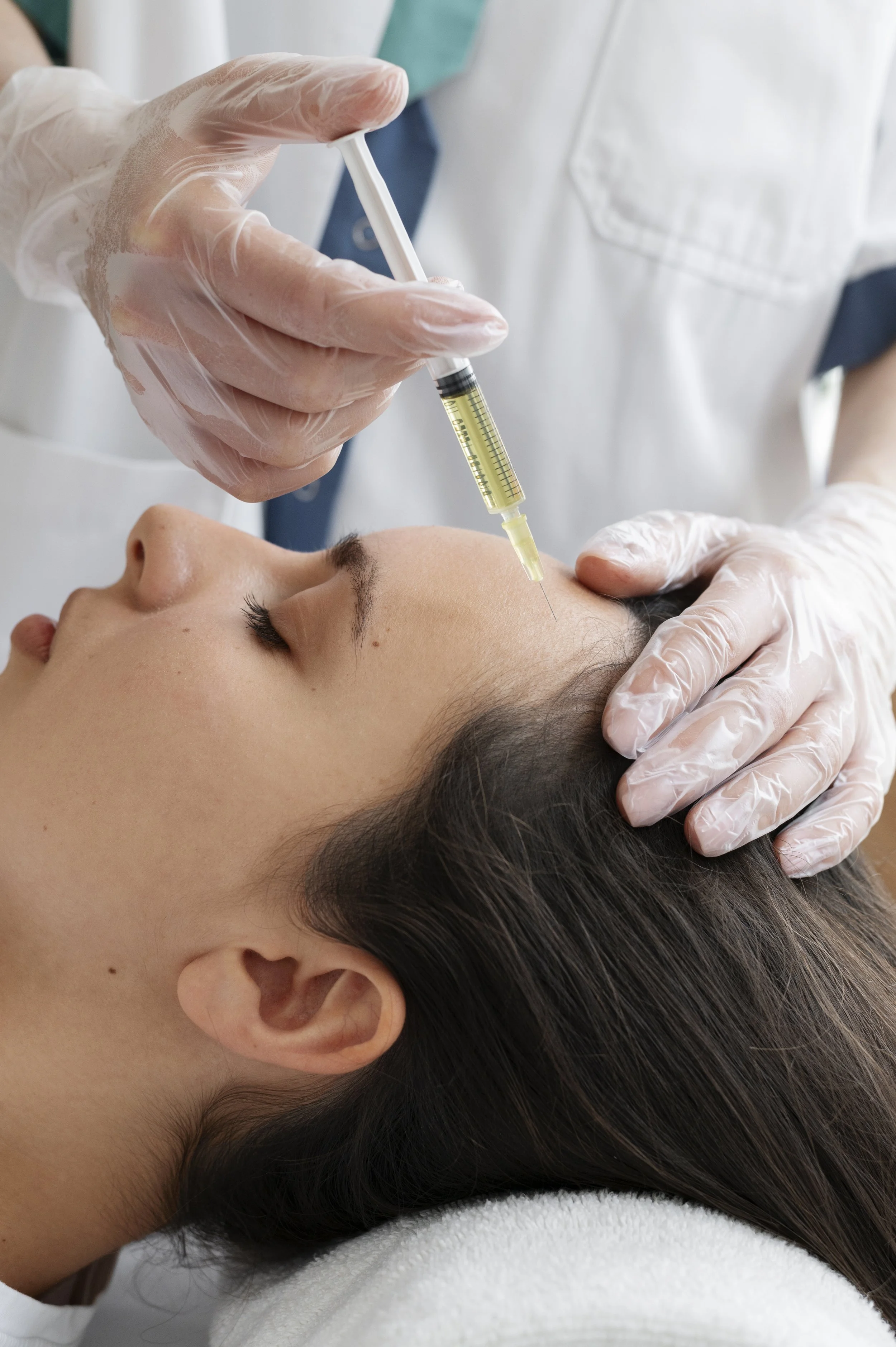 side-view-woman-getting-prp-treatment.jpg