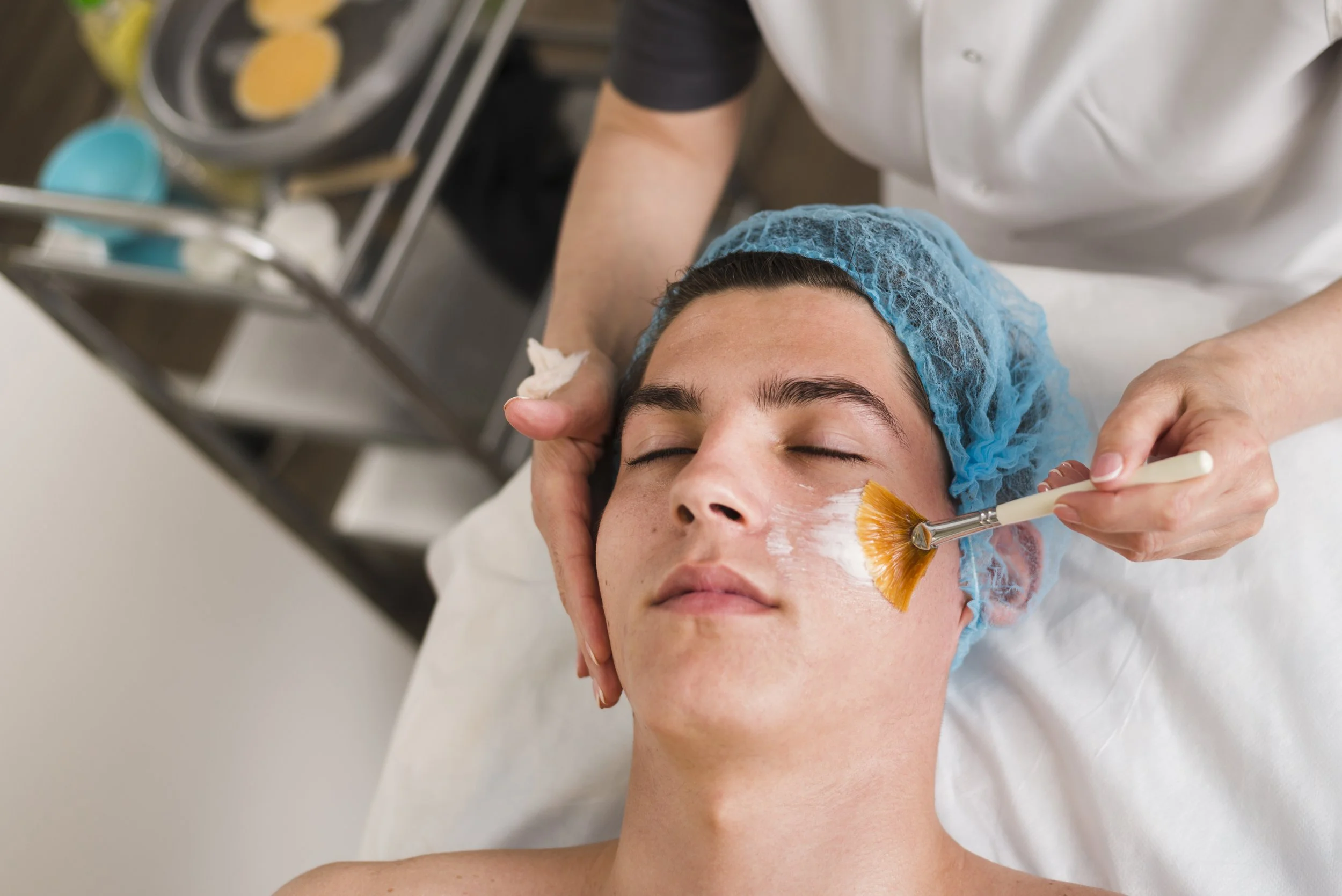 boy-receiving-facial-treatment-beauty-salon.jpg