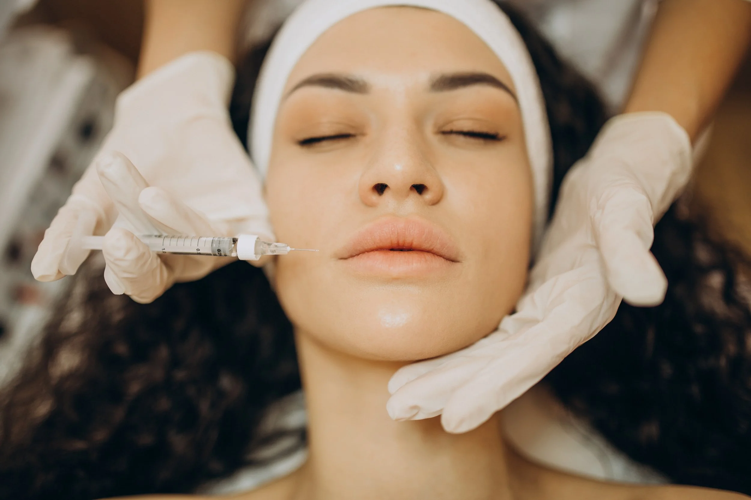 woman-making-injections-cosmetologist.jpg