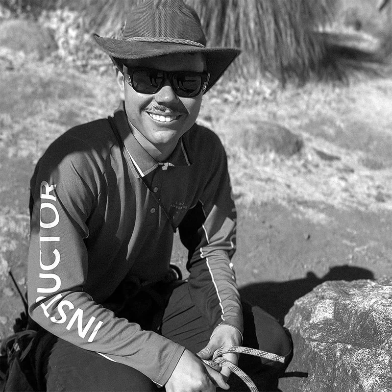 Sam, an instructor at Venture Swan Valley, wearing a hat and smiling outdoors.