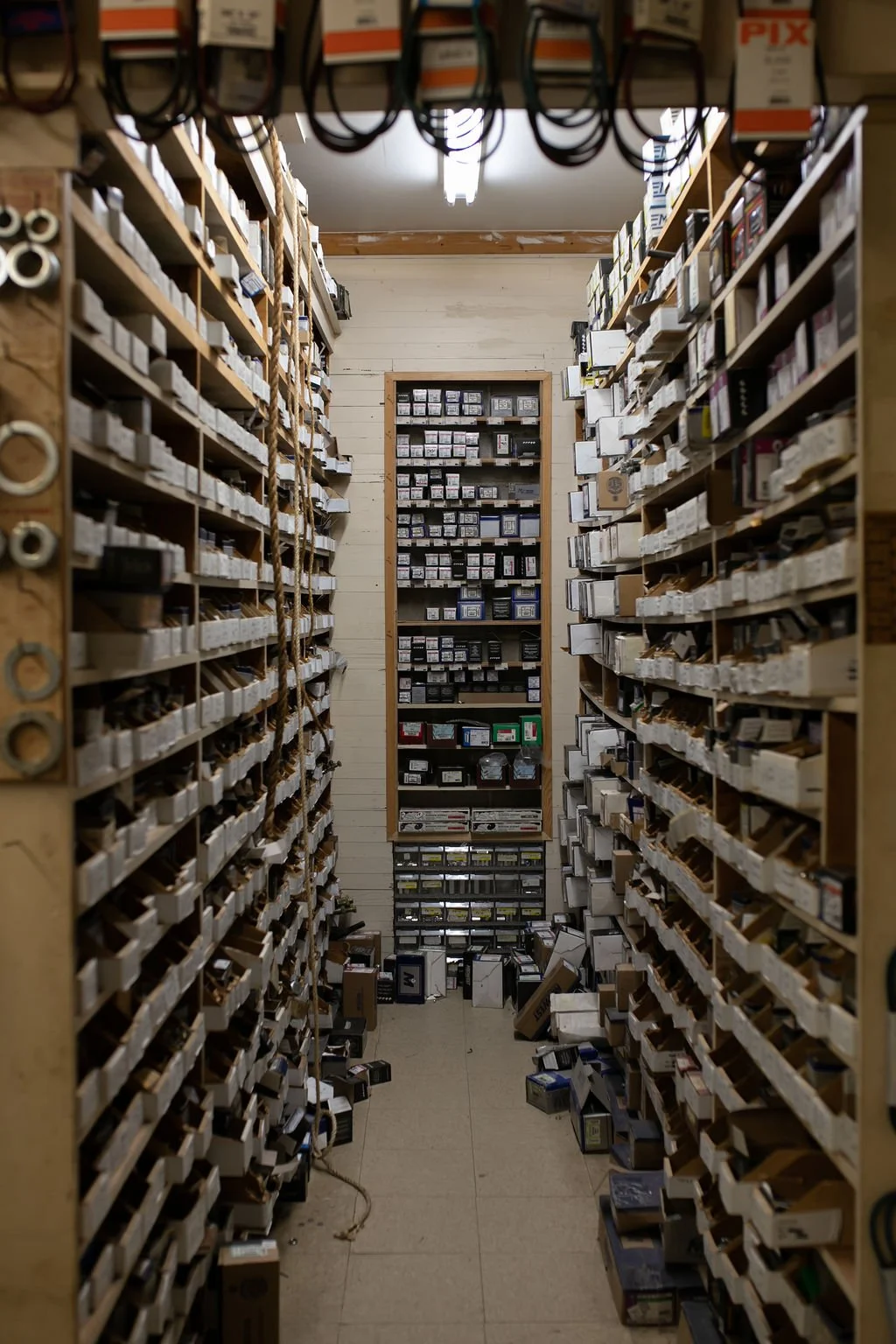 Floor-to-ceiling bolt aisle at Felton Hardware in Felton, Delaware, featuring a wide selection of fasteners, screws, and hardware.