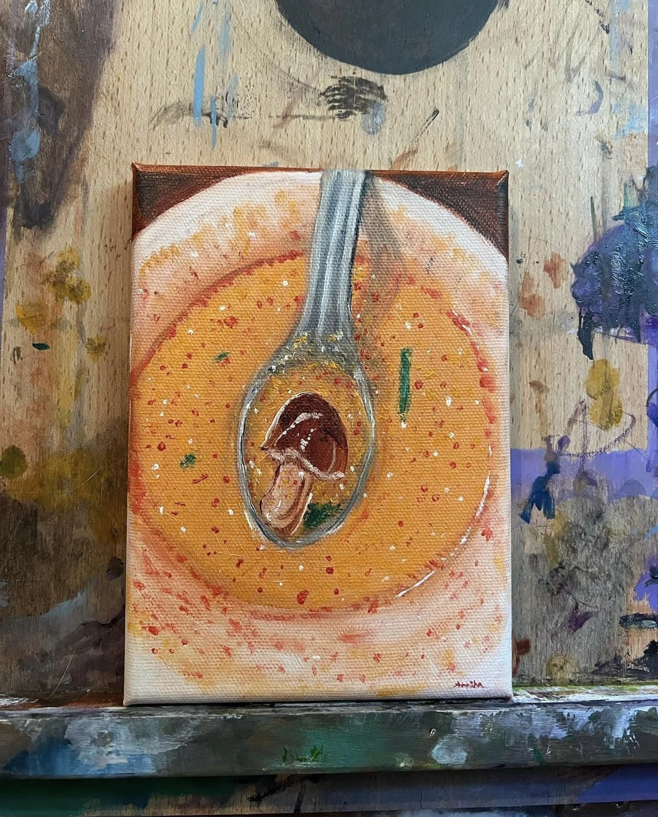 eye of mushroom soup on easle.jpg