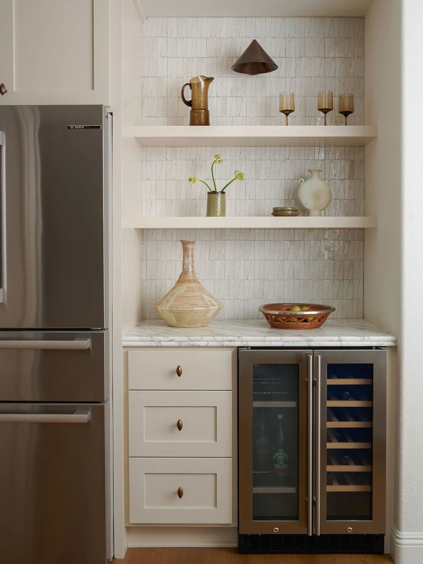 Vintage styling pieces, funky mosaic zellige tile, oil rubbed bronze hardware and lighting - this coffee bar is a moment🤍

_________________________

Design: @californiarevivalstudio | Project: #CRSxAvenidaCiruela
Build: @sdhomeremodels 
Photography