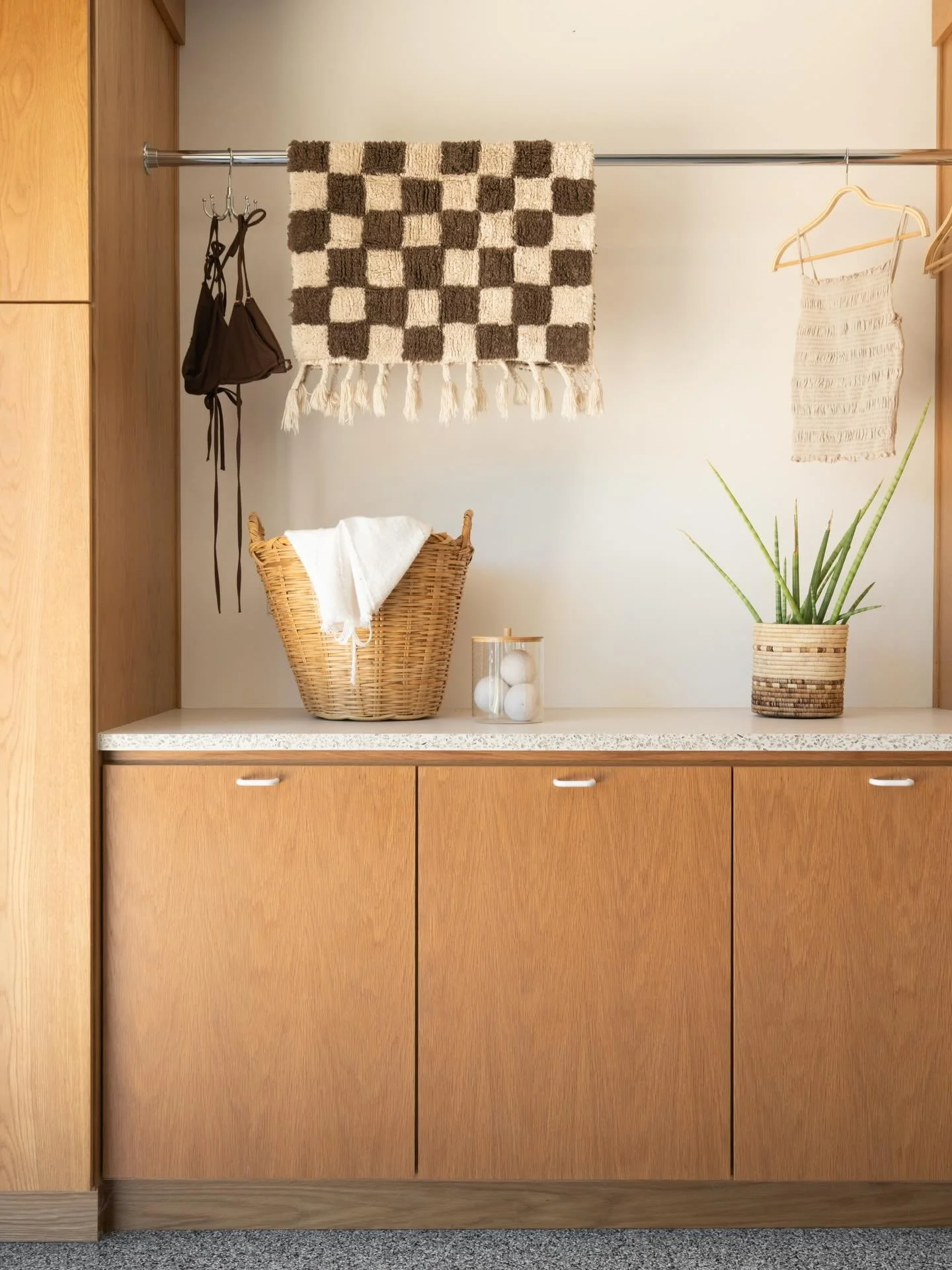 This home didn&rsquo;t have space for a proper laundry room, so we found a way to create a functional laundry area in the garage featuring custom white oak cabinetry and a concrete countertop! 

_______________________

Design: @californiarevivalstud