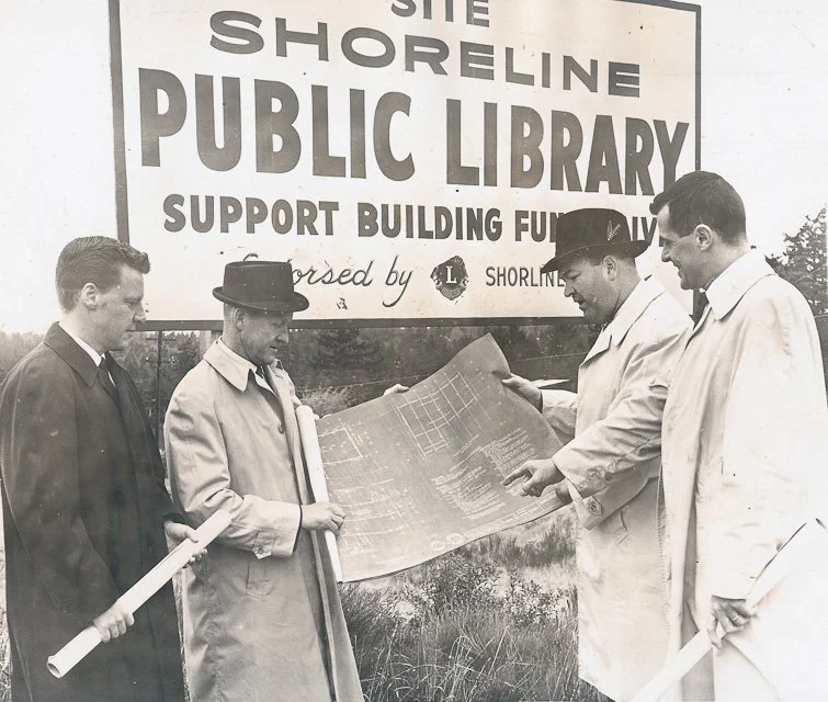 1960. Shoreline Public Library Fund Drive at the corner of NE 175th Street and 5th Avenue NE. Note the typo in "Shorline Lions".
