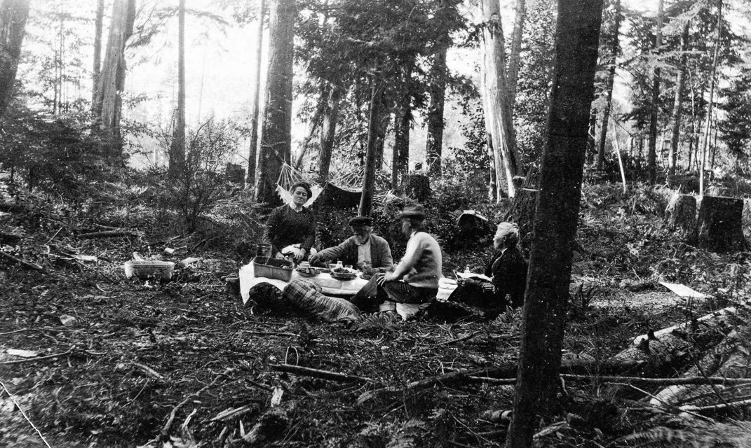 About 1905. Picnic in the woods at Richmond Beach. L-R Edith St John, Robert St John and relatives.