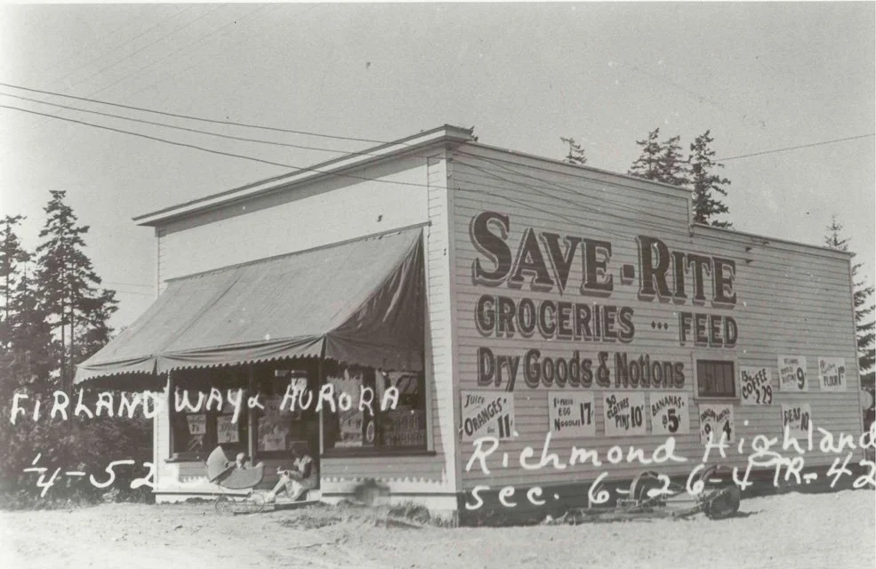 1936. Save-Rite Groceries Feed Dry Goods and Notions. Save-Rite Groceries at Firlands Way and 185th near Aurora was former location of Bessie B Waffle Shoppe. Note young woman with baby carriage by the front door. The building itself was the Rogers G